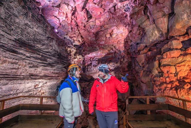 tourists-lava-tunnel-iceland