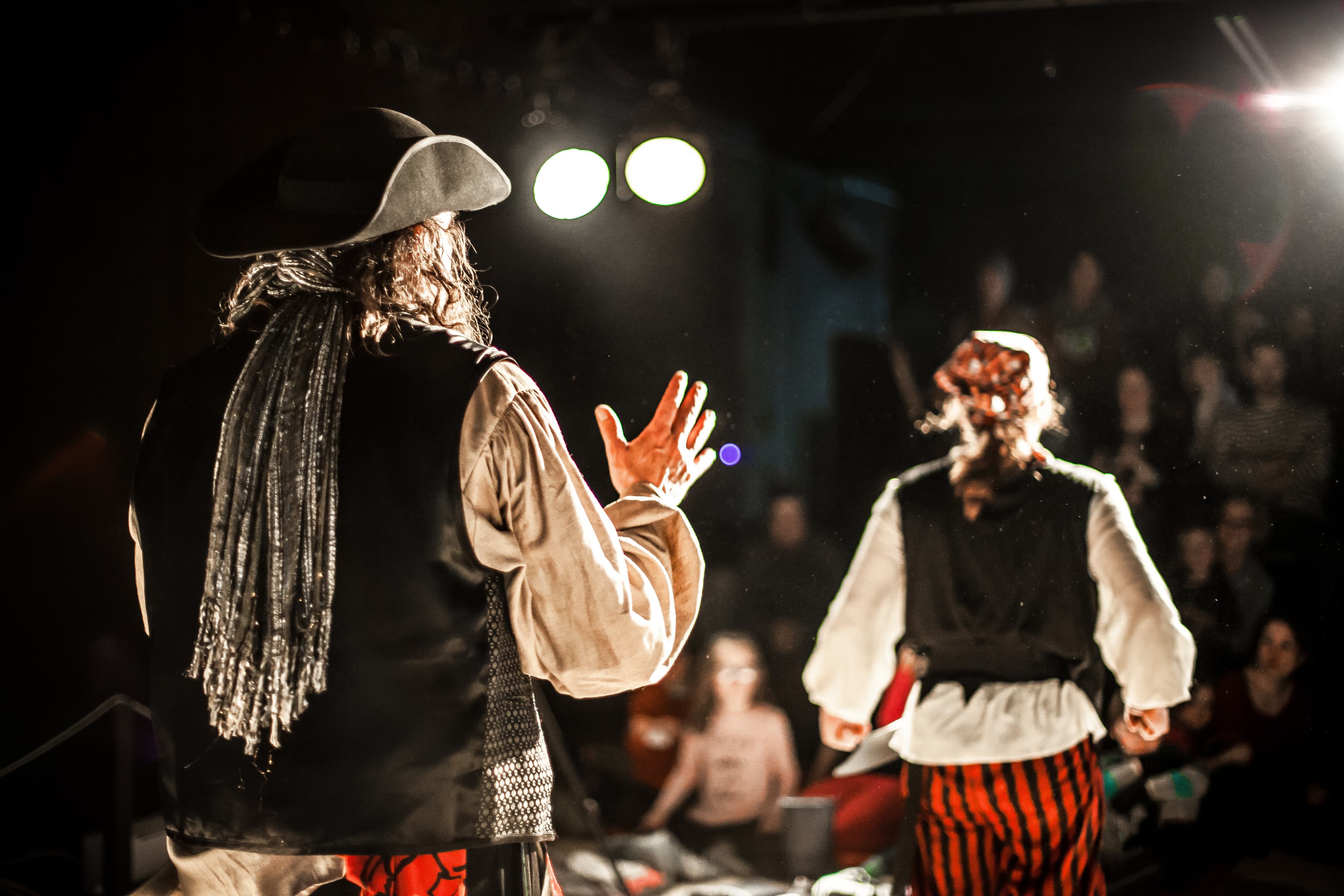 Comedy pirates perform on stage