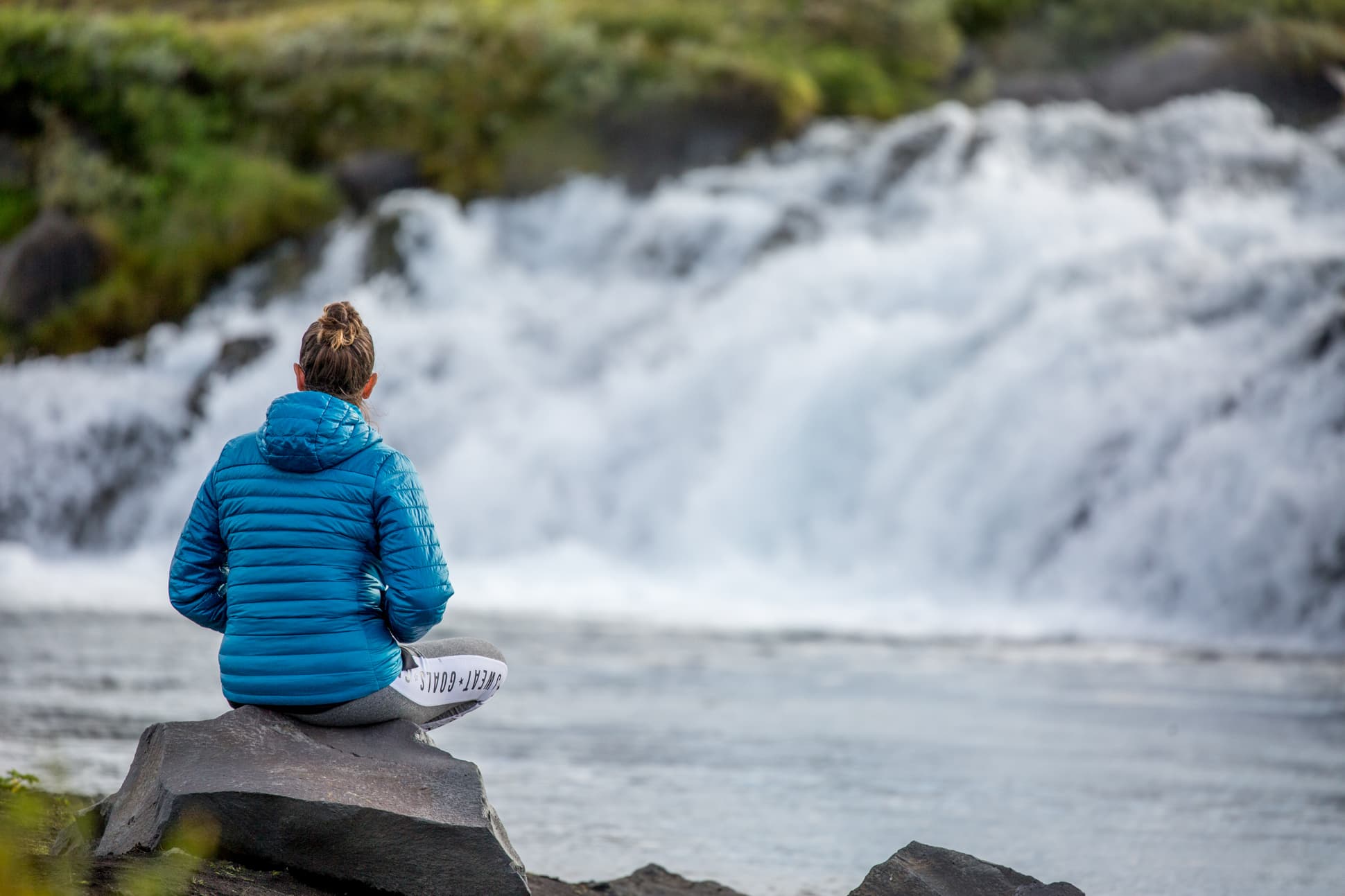 tourist-watching-waterfall-iceland