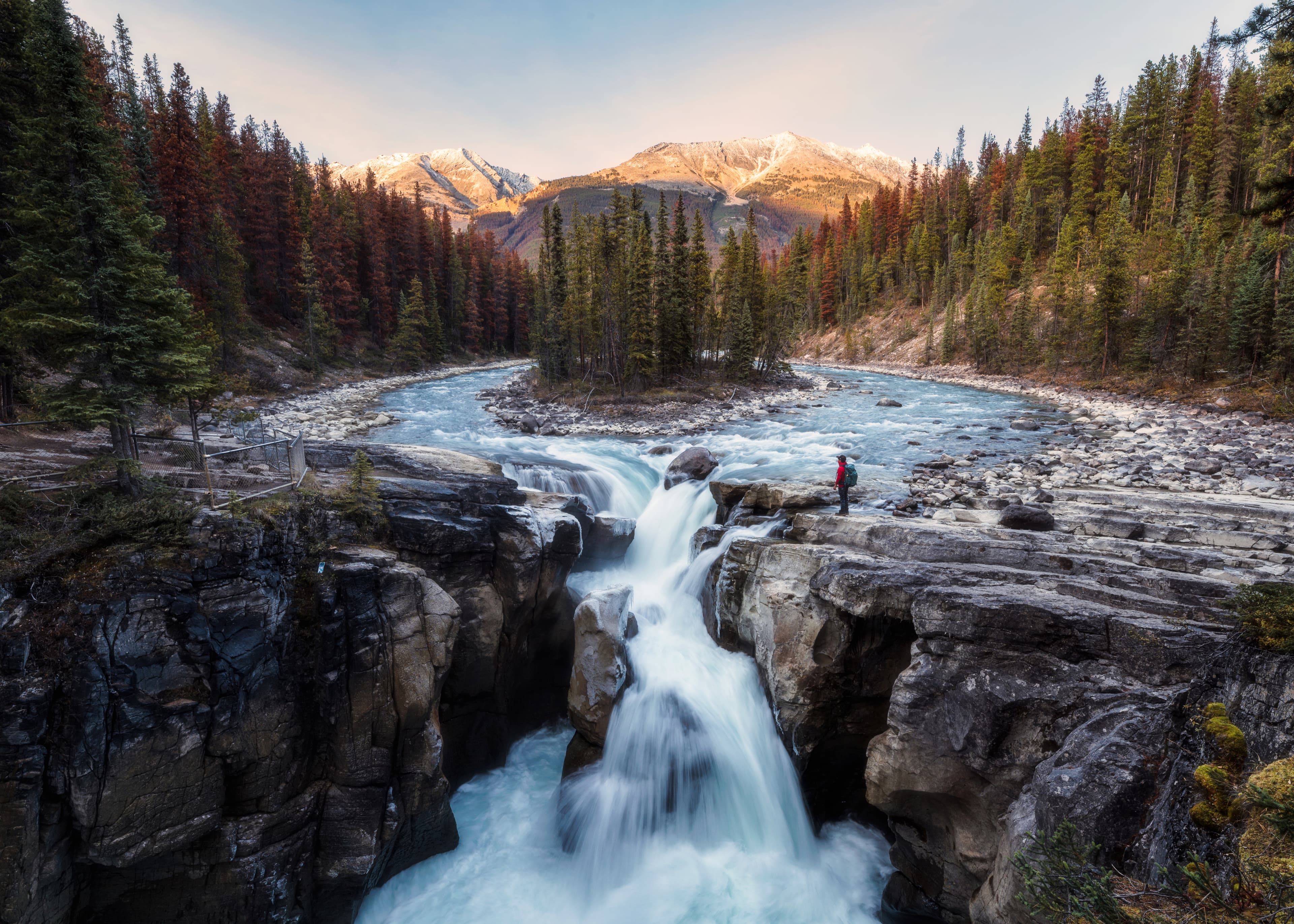 person enjoying Sunwapta Falls
