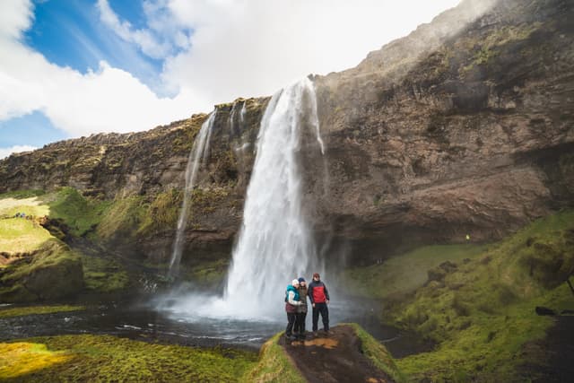 Seljalandsfoss-waterfall-South-Iceland-couple