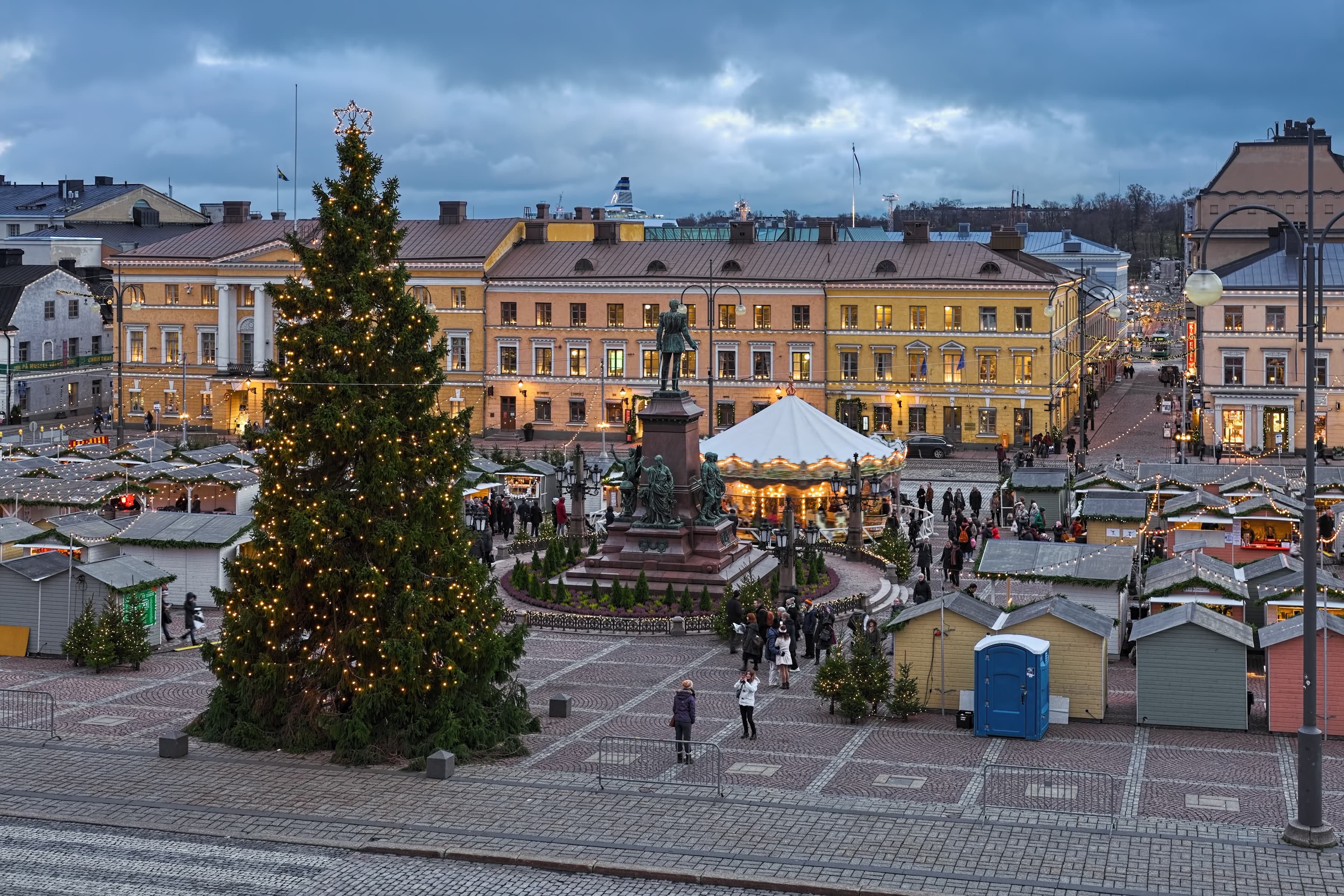 Christmas market at the Senate Square of Helsinki, Finland. View from the Helsinki Cathedral. The market is the oldest and largest Christmas event in the city. Christmas market at the Senate Square of Helsinki, Finland