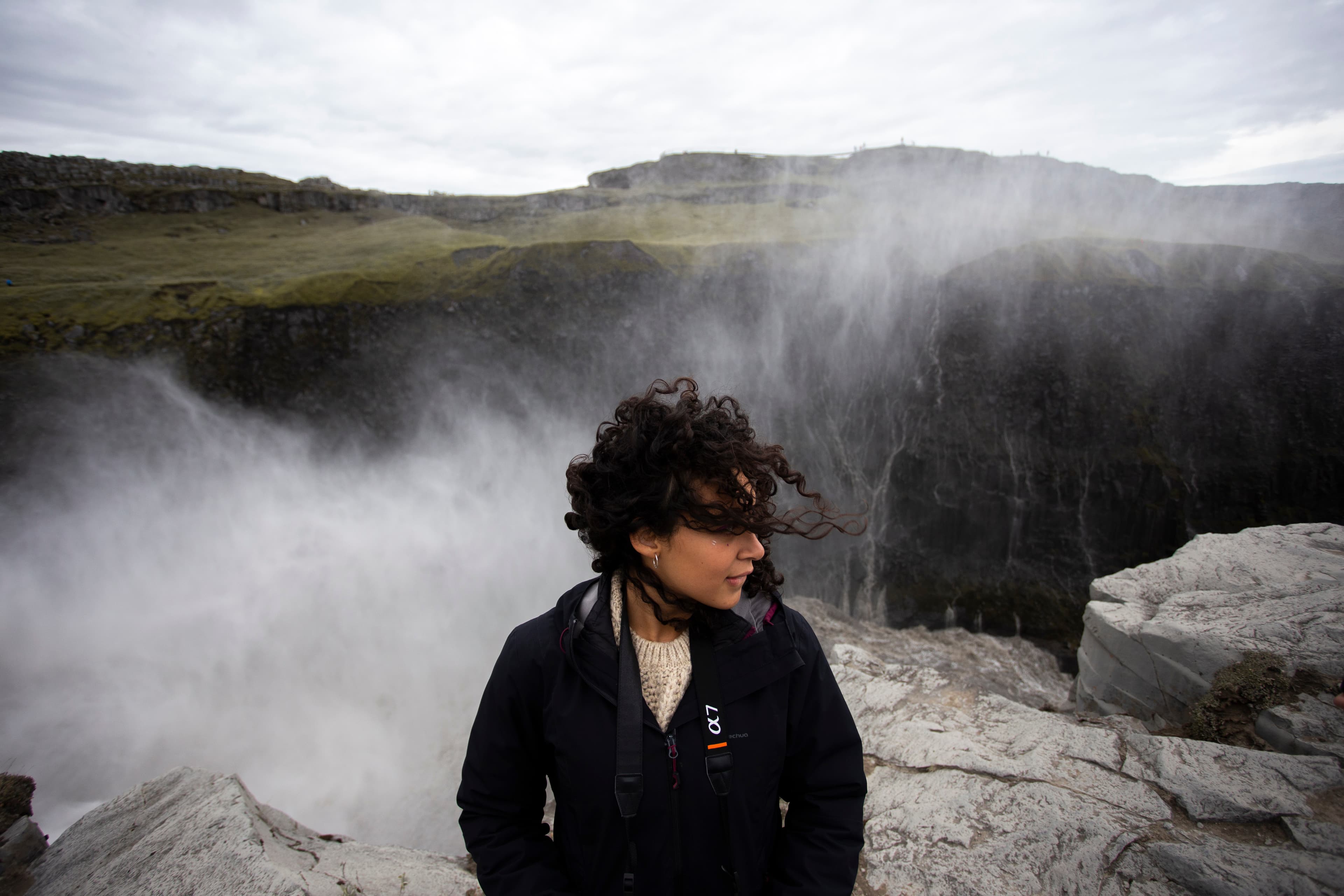 young-female-tourist-gullfoss-iceland