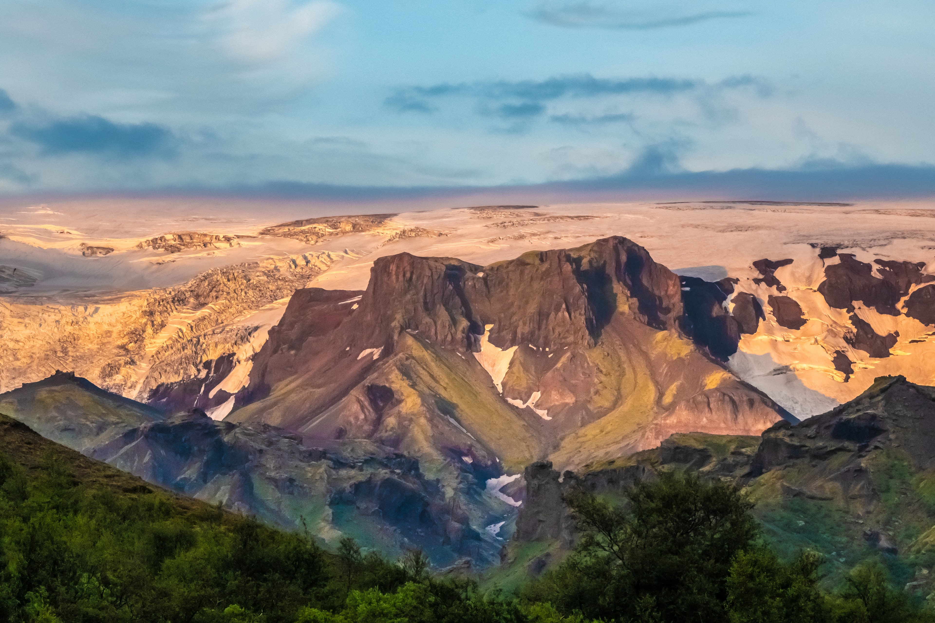 View of the Myrdalsjokull glacier , covering the active volcano Katla, Thorsmork, Highlands at the southern end of the famous Laugavegur hiking trail. View of the Myrdalsjokull glacier , covering the active volcano Katla, Thorsmork, Highlands at the southern end of the famous Laugavegur hiking trail.