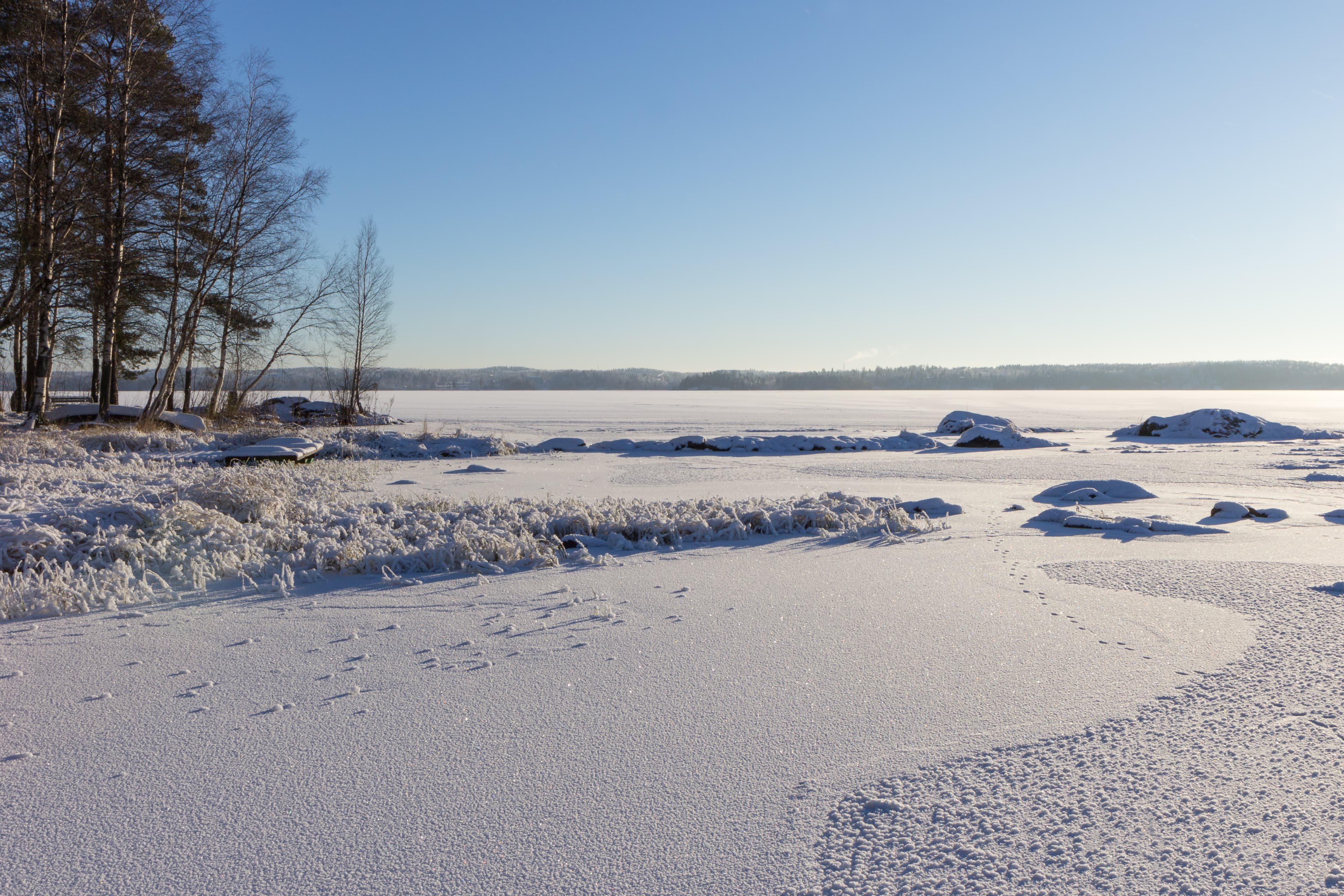 Frosty and snowy Lake Pyhäjärvi in Tampere, Finland in winter
