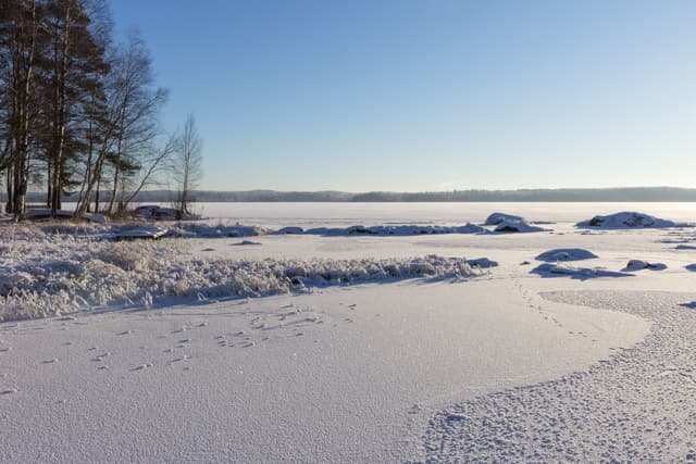 Frosty and snowy Lake Pyhäjärvi in Tampere, Finland in winter