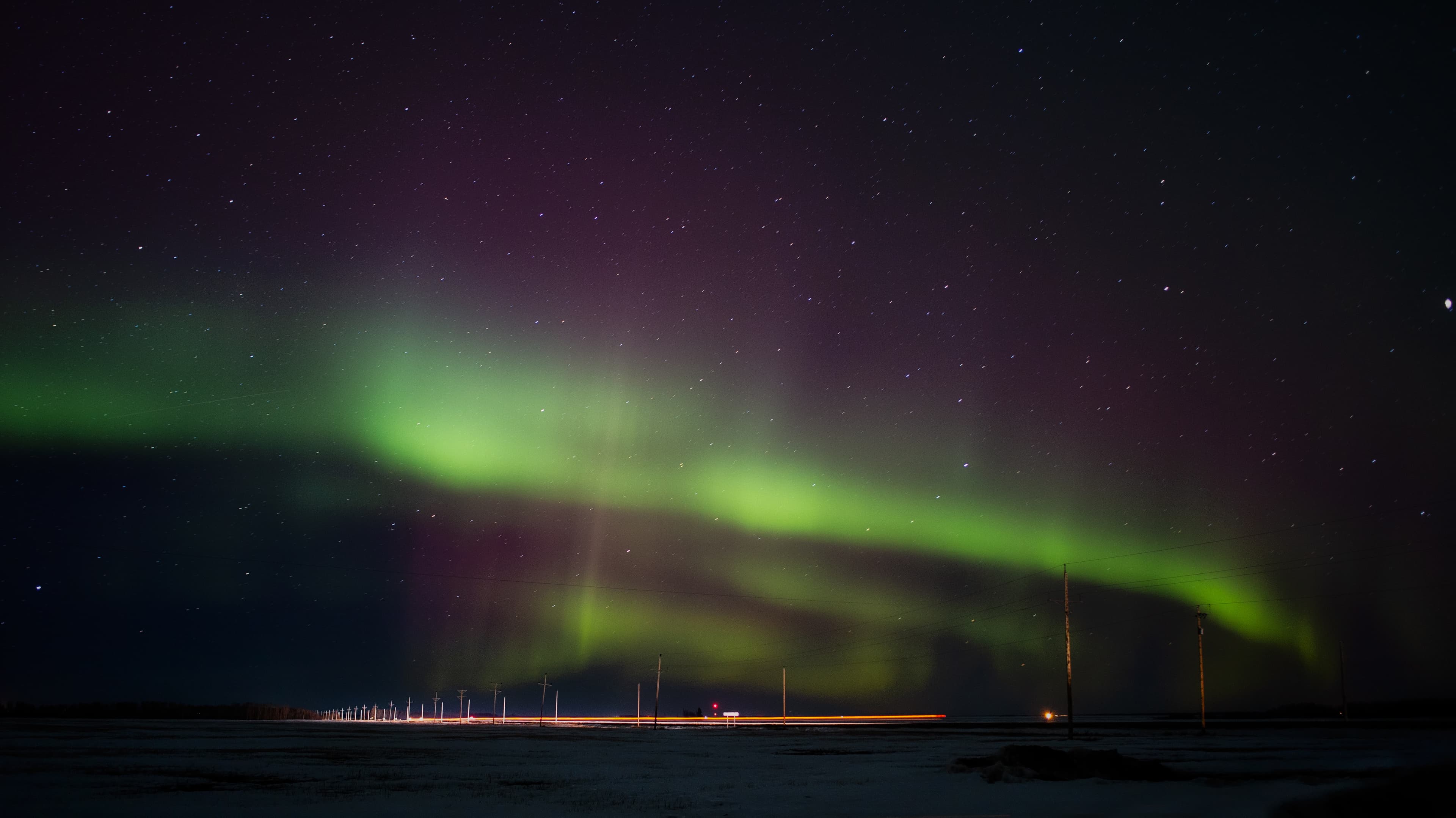 Colorful northern lights over a saskatchewan prairies winter landscape at night Northwest Territories Region 08
