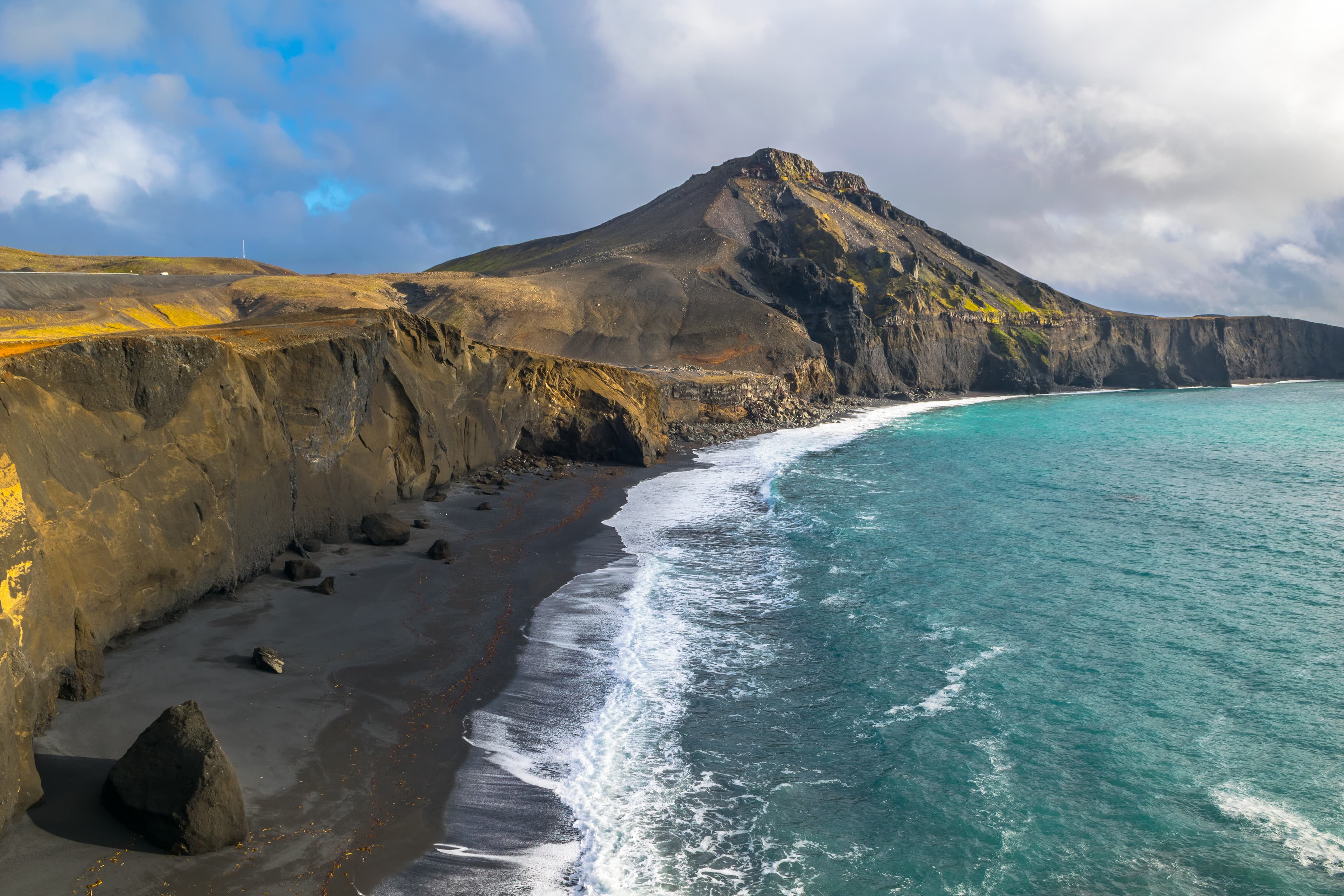 Beautiful view of Festarfjall mountain an beach in Grindavik village, Reykjanes peninsula - Iceland