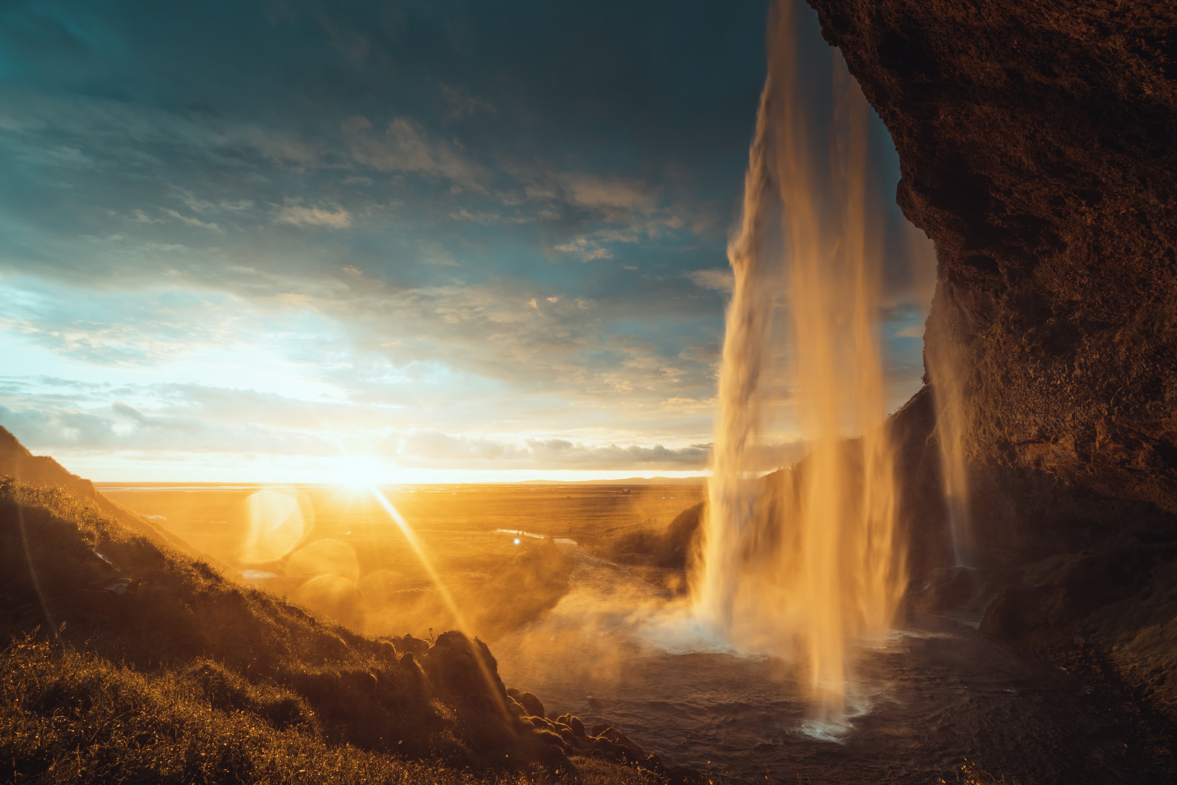 Seljalandsfoss waterfall at sunset, Iceland Seljalandsfoss waterfall at sunset, Iceland