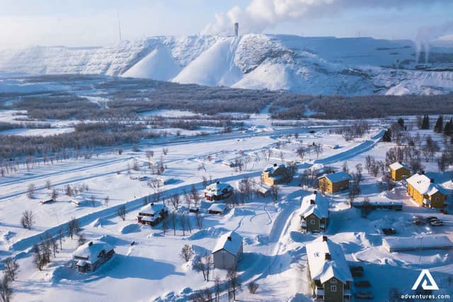 Aerial winter view of Kiruna, the northernmost town in Sweden, province of Lapland, winter sunny picture shot from drone Aerial winter view of Kiruna, the northernmost town in Sweden, province of Lapland, winter sunny picture shot from drone