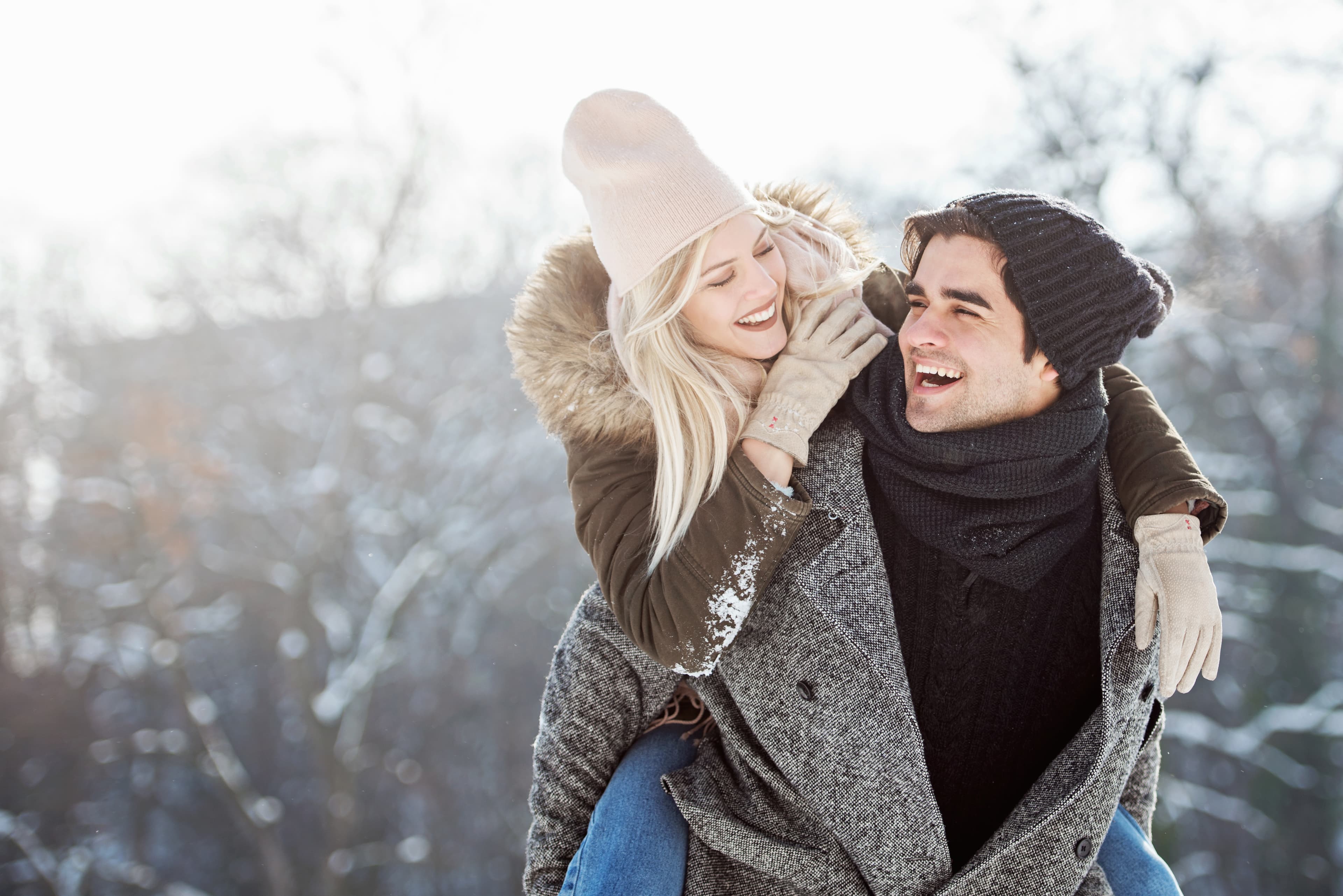 Two young people enjoying in the snow