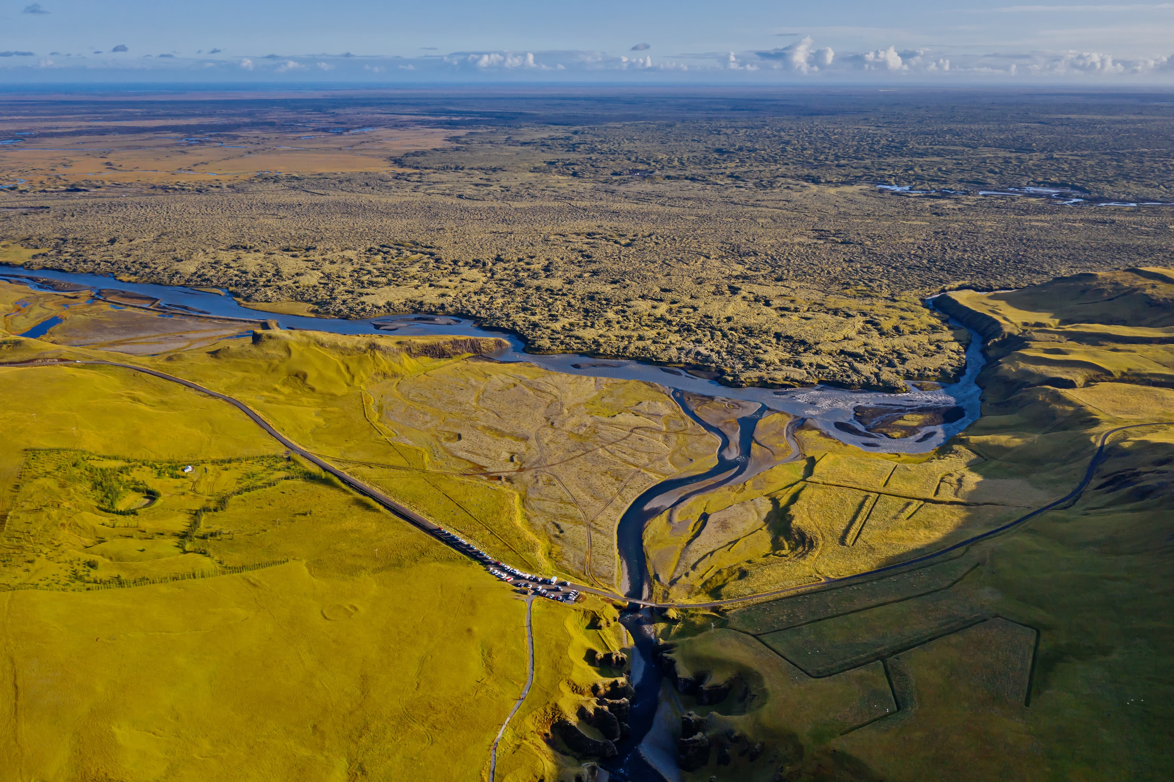 The most picturesque canyon Fjadrargljufur and the shallow creek, which flows along the bottom of the canyon. Fantastic country Iceland. September 2019. aerial drone shot The most picturesque canyon Fjadrargljufur and the shallow creek, which flows along the bottom of the canyon. Fantastic country Iceland. September 2019. aerial drone shot