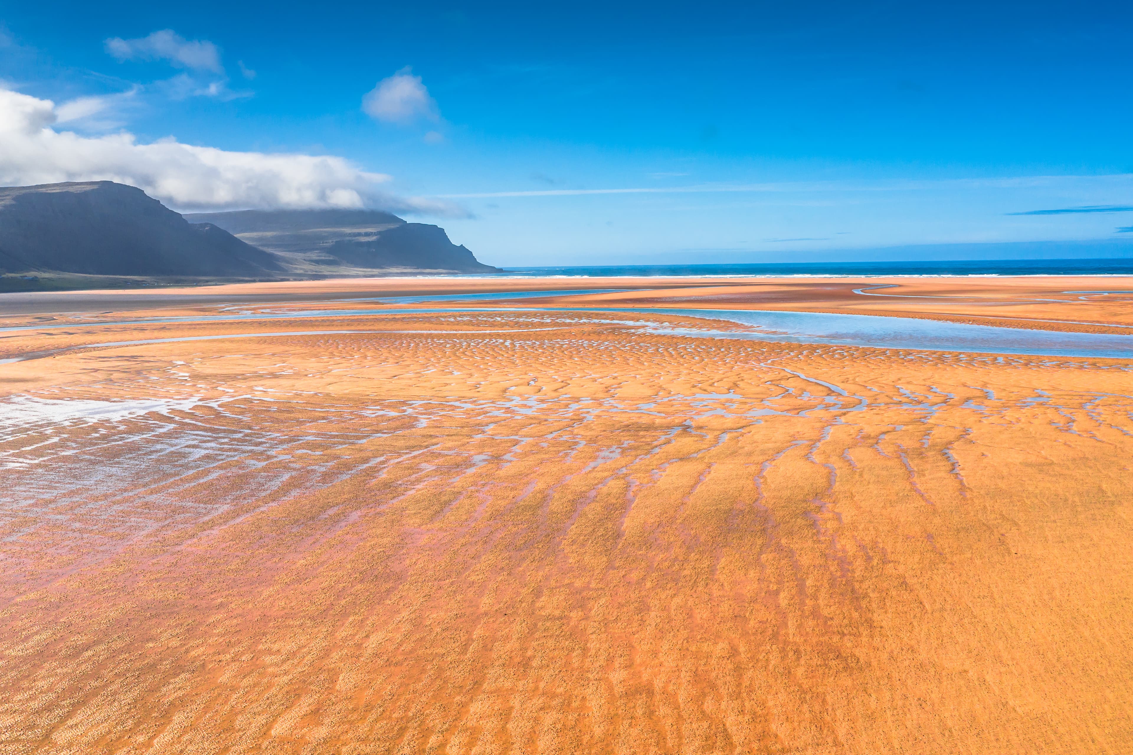 Raudasandur or red sandy beach in the westfjords of Iceland Raudasandur beach at the west fjords of Iceland