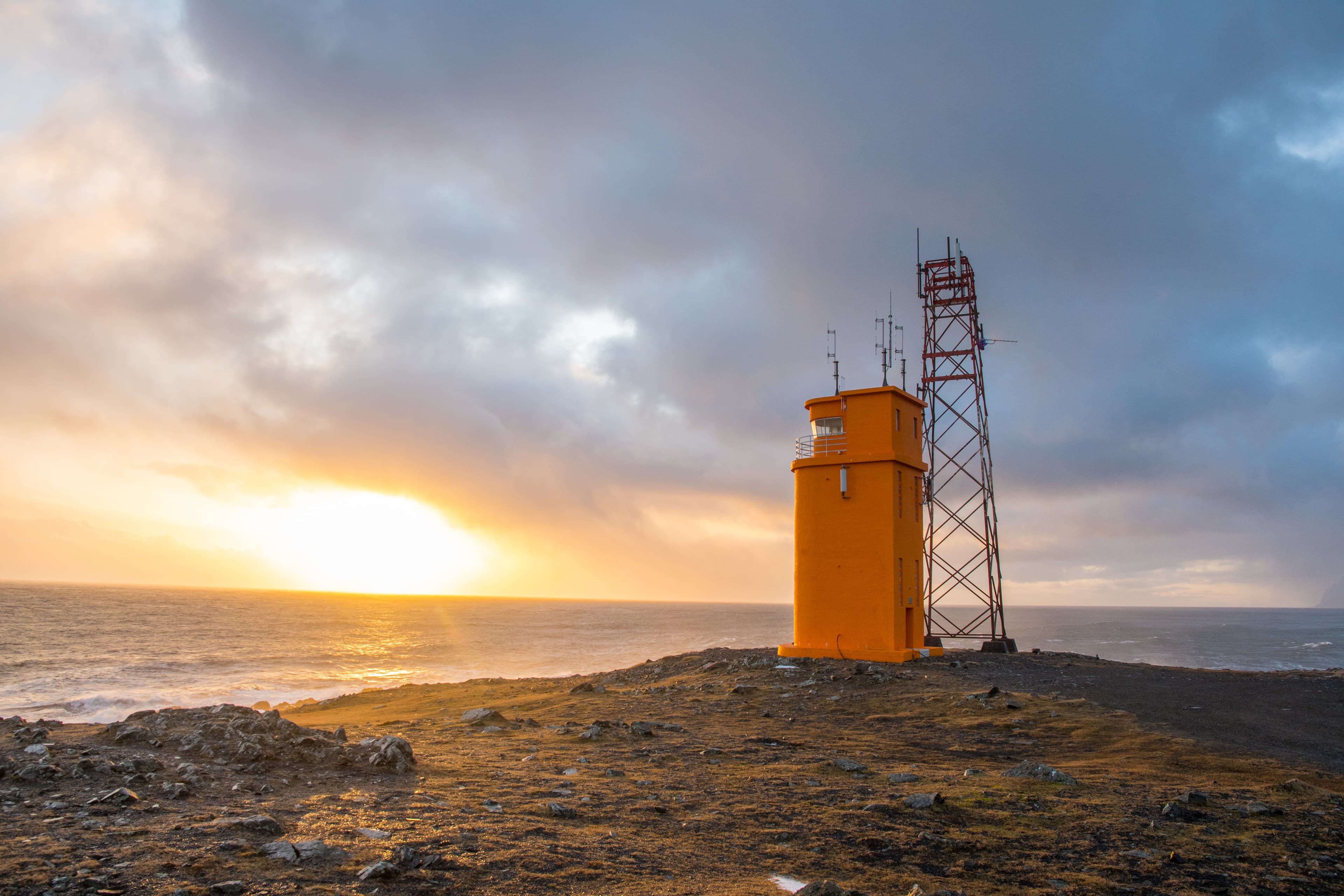 The lighthouse of Hvalnes in east Iceland with the atlantic ocean in the background hvalnes-lighthouse-stokknes-peninsula-iceland