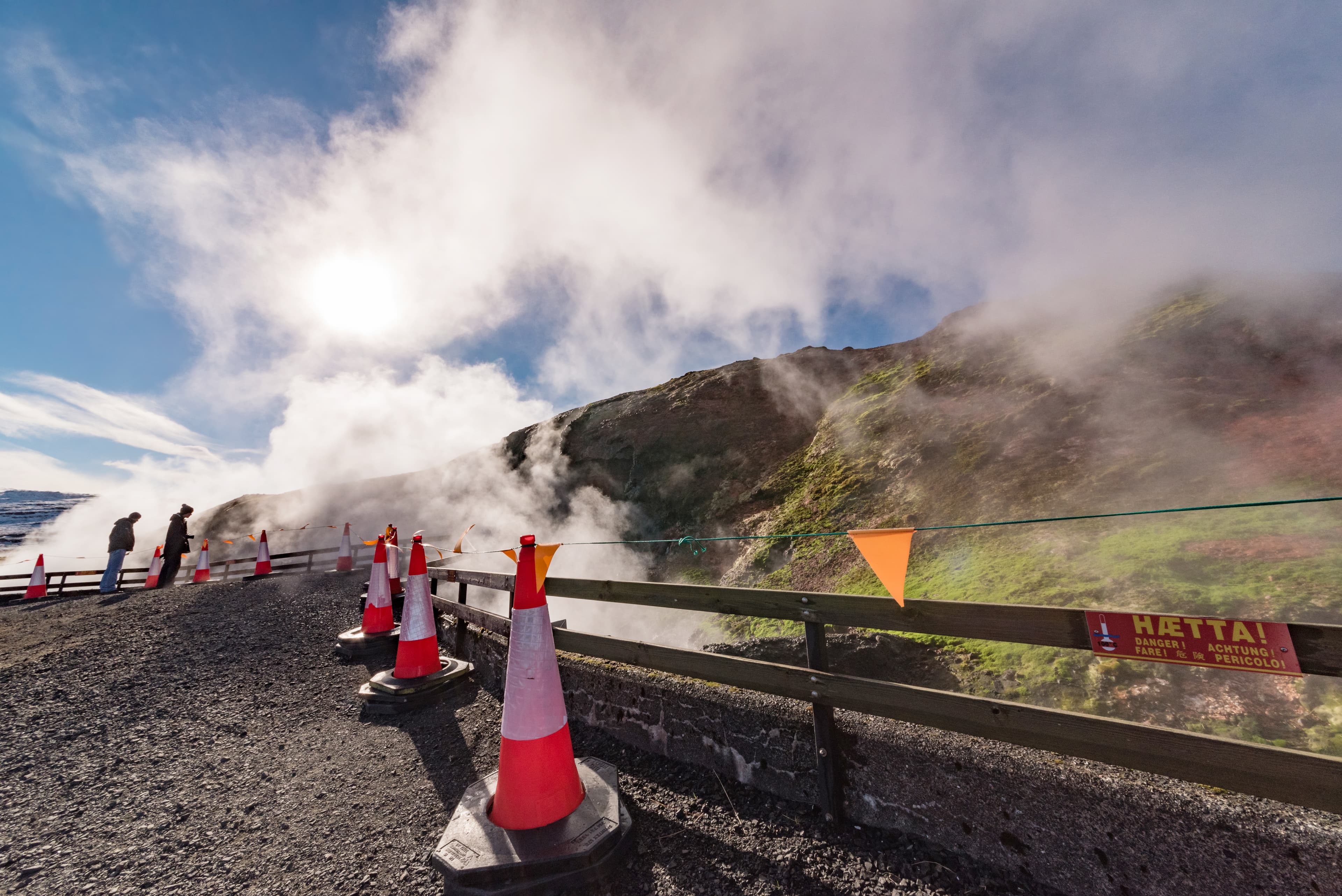 hot springs at Deildartunguhver in iceland with signs "DANGER"