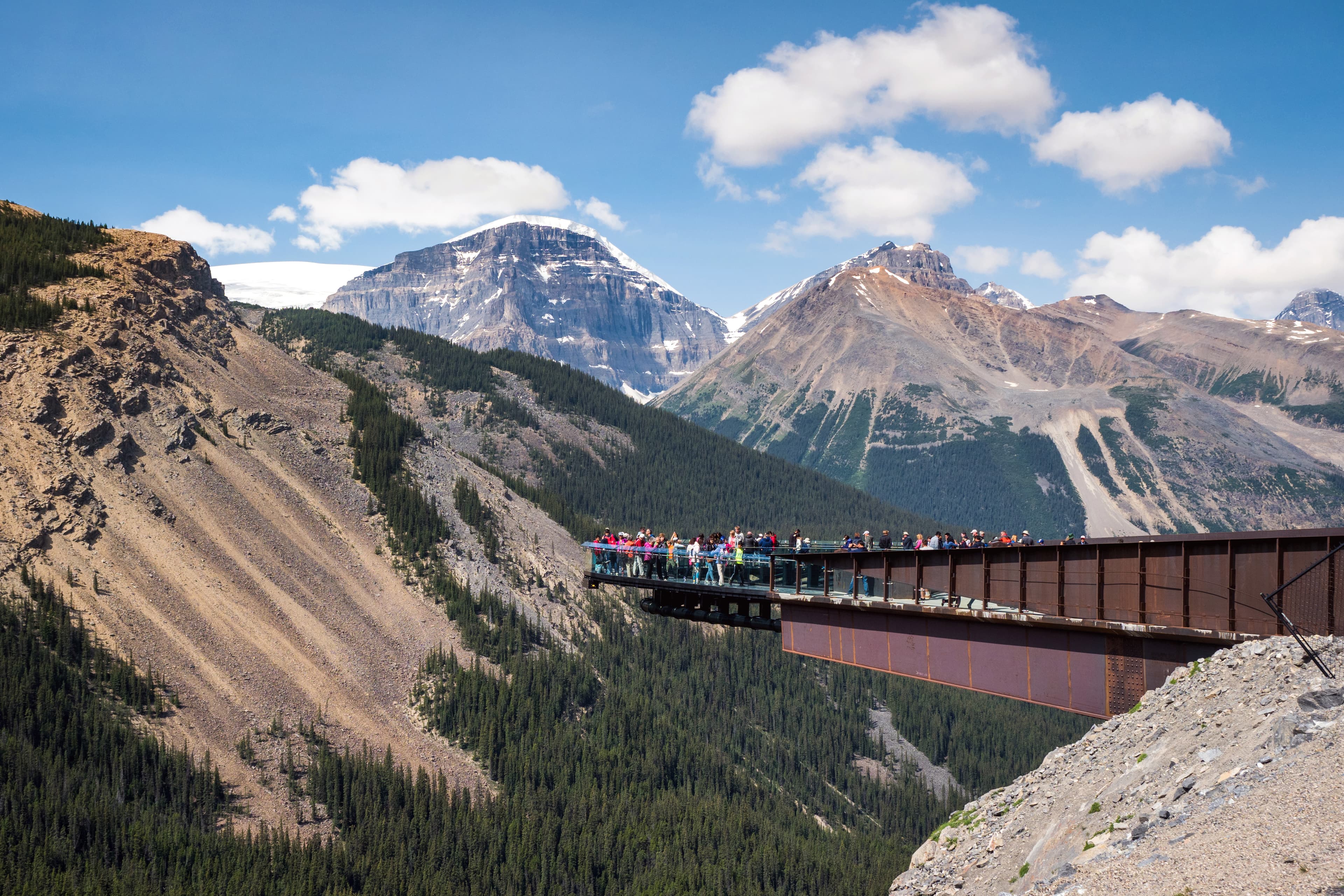 Japser, Alberta, Canada - July 25, 2018: Tourists at Glacier Skywalk during summer in Jasper National Park, Canadian Rockies, Alberta, Canada. View point at Columbia Icefields Parkway
