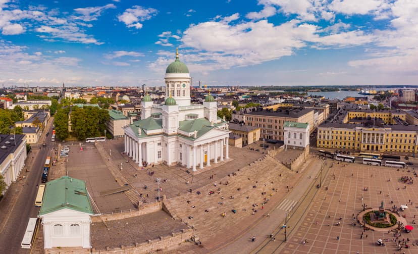 Helsinki Suurkirkko, Finland: beautiful top view from drone on historic city centre, Senate square and Evangelical Lutheran Church St. Nicholas, Cathedral Basilica. Sanny summer day Helsinki Suurkirkko, Finland: beautiful top view from drone on historic city centre, Senate square and Evangelical Lutheran Church St. Nicholas, Cathedral Basilica. Sanny summer day.