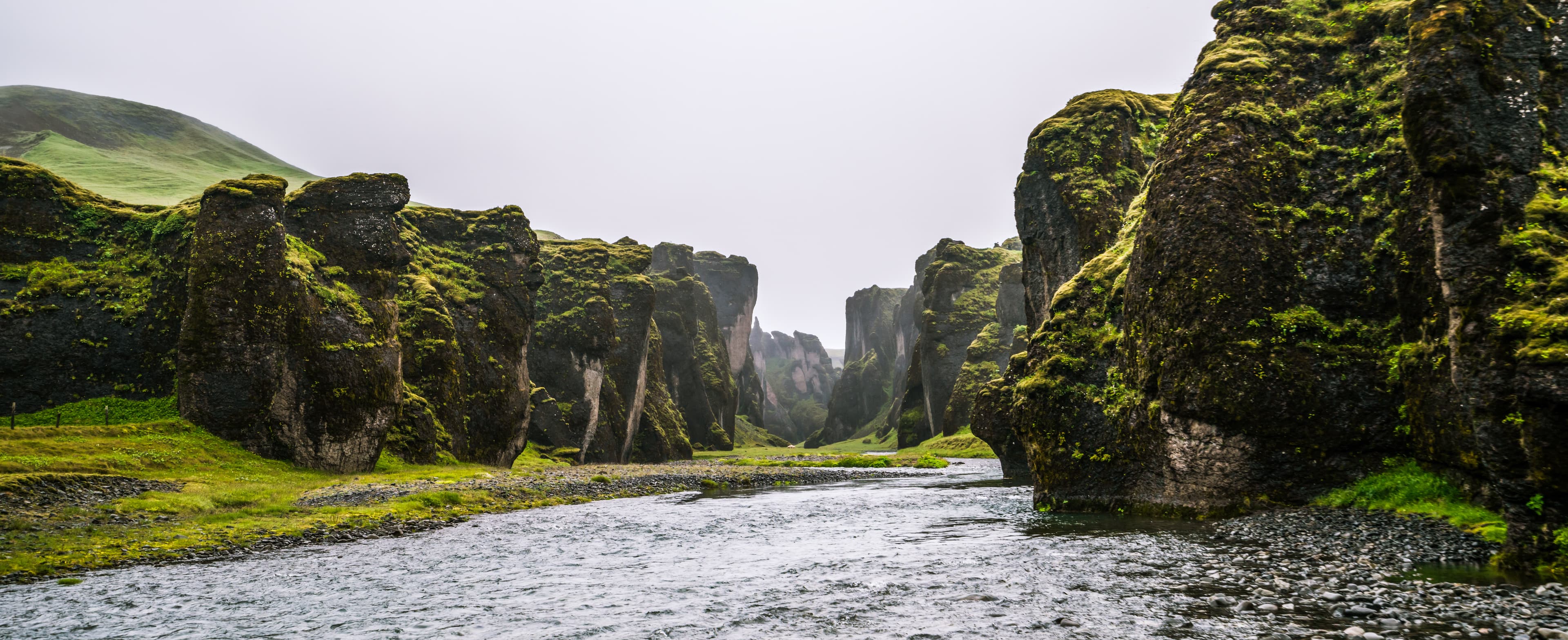Unique landscape of Fjadrargljufur in Iceland. Top tourism destination. Fjadrargljufur Canyon is a massive canyon about 100 meters deep and about 2 kilometers long, located in South East of Iceland. Unique landscape of Fjadrargljufur in Iceland. Top tourism destination. Fjadrargljufur Canyon is a massive canyon about 100 meters deep and about 2 kilometers long, located in South East of Iceland.