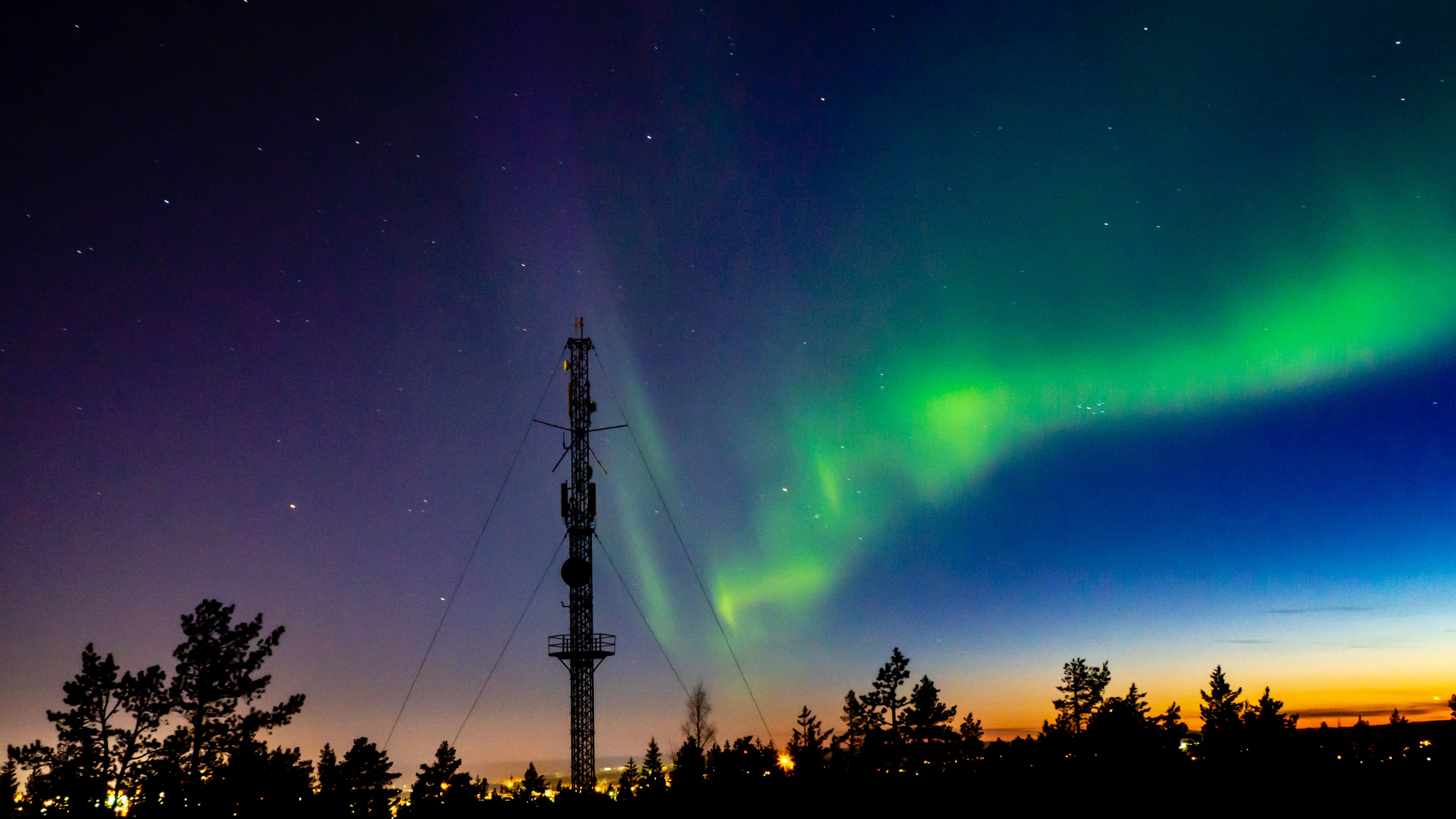 OLYMPUS DIGITAL CAMERA Northern lights scenery above Rovaniemi Finland with transmitter