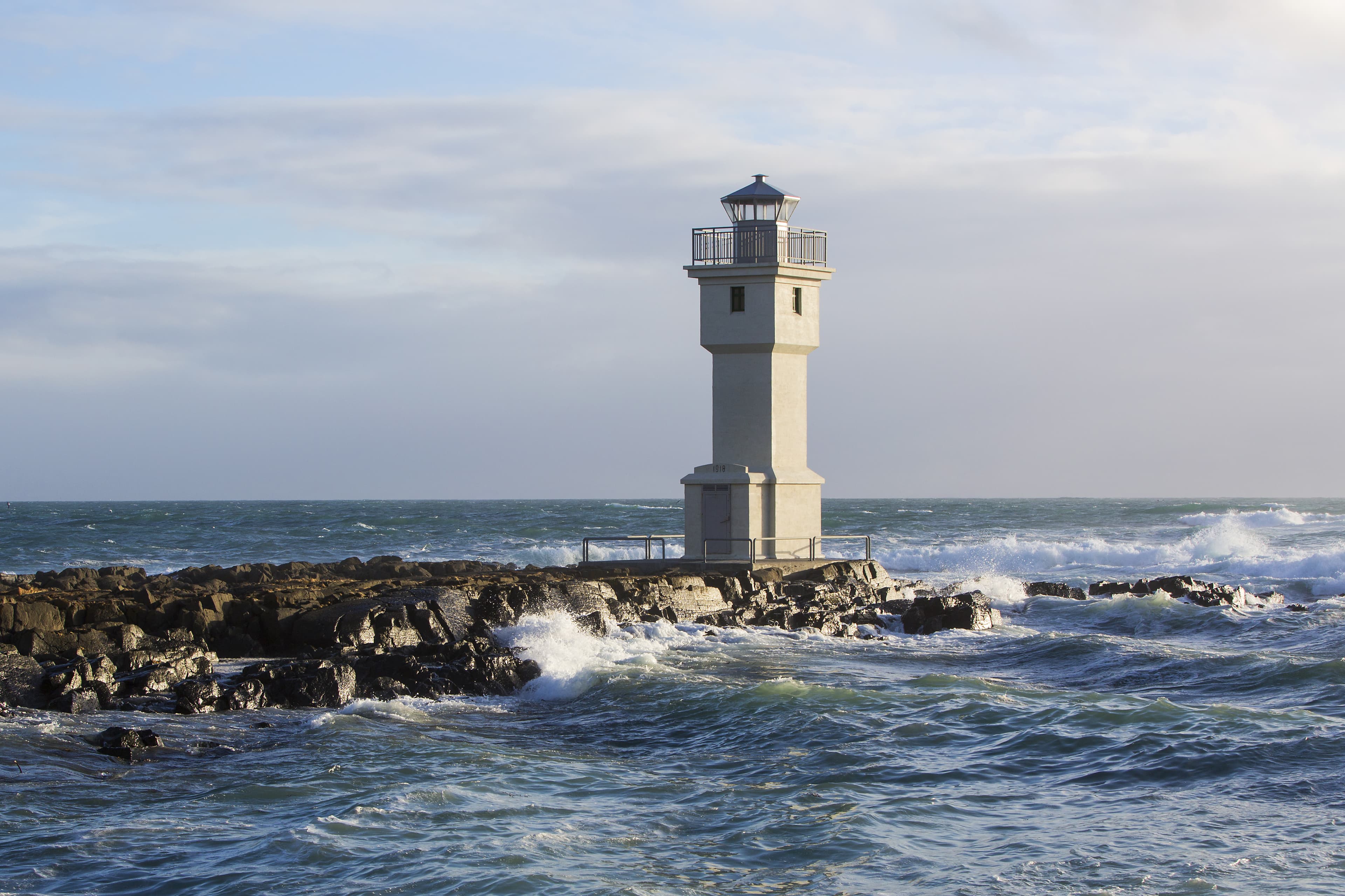White lighthouse at the port of Akranes, Iceland Lighthouse at the port of Akranes, Iceland