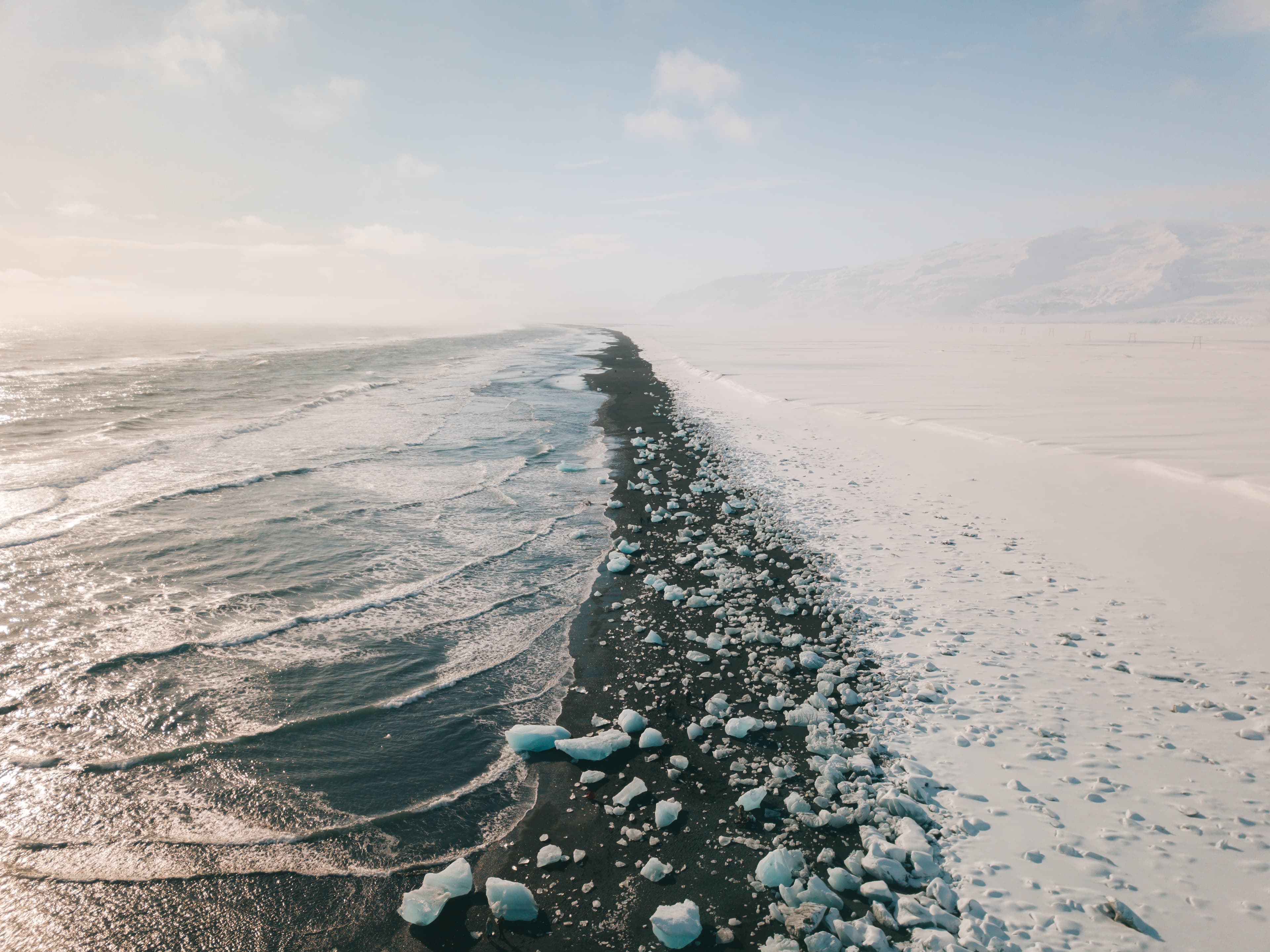 Ice rock with black sand beach at Jokulsarlon beach. Diamond beach in Iceland Ice rock with black sand beach at Jokulsarlon beach. Diamond beach in Iceland