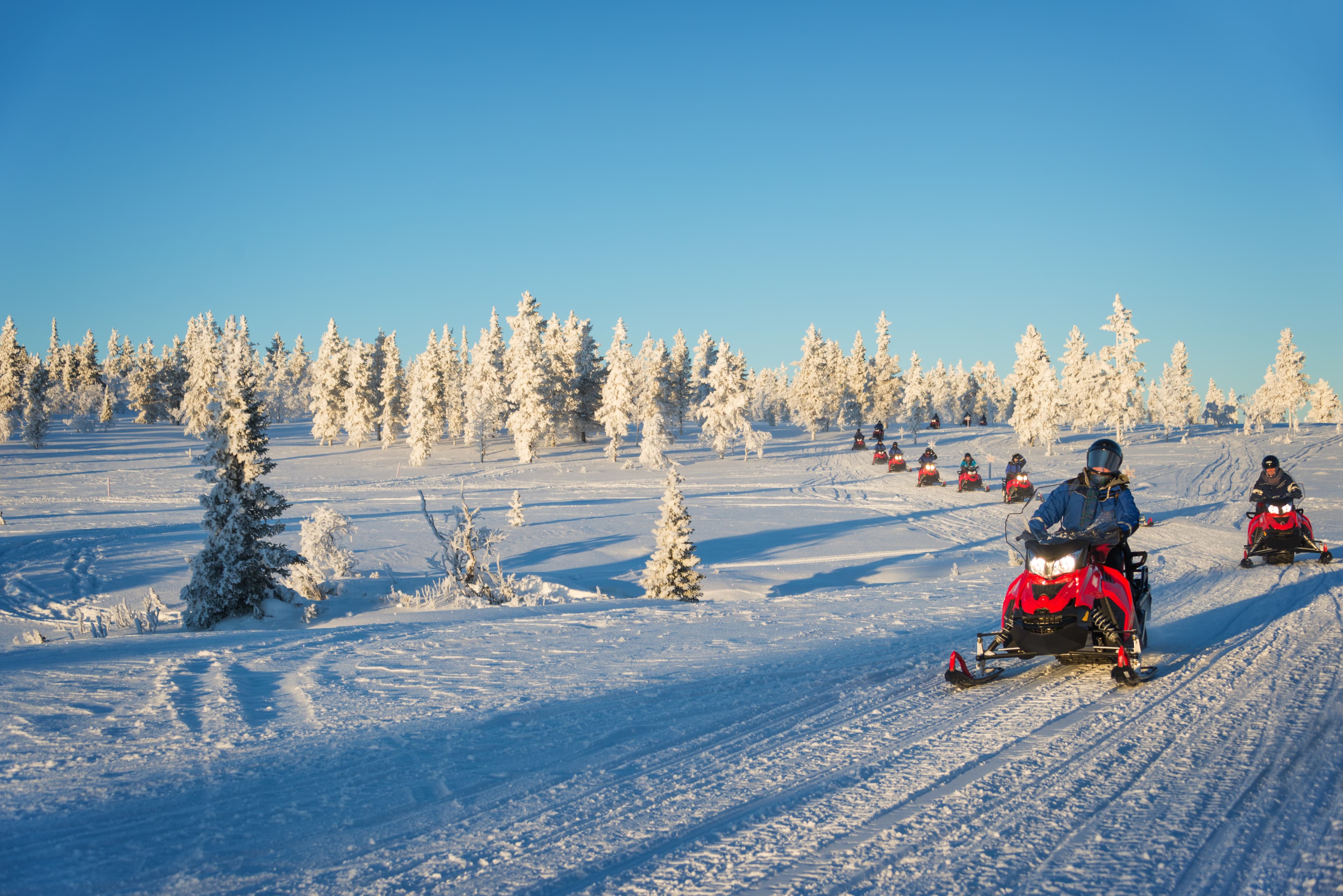 Group of snowmobiles in Lapland, near Saariselka, Finland Ontario Region 13