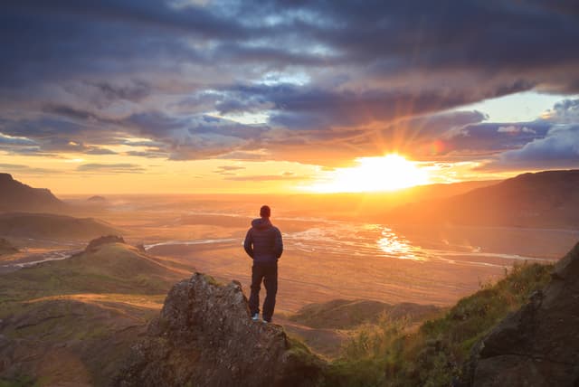 Man watching sunset in Iceland's highlands