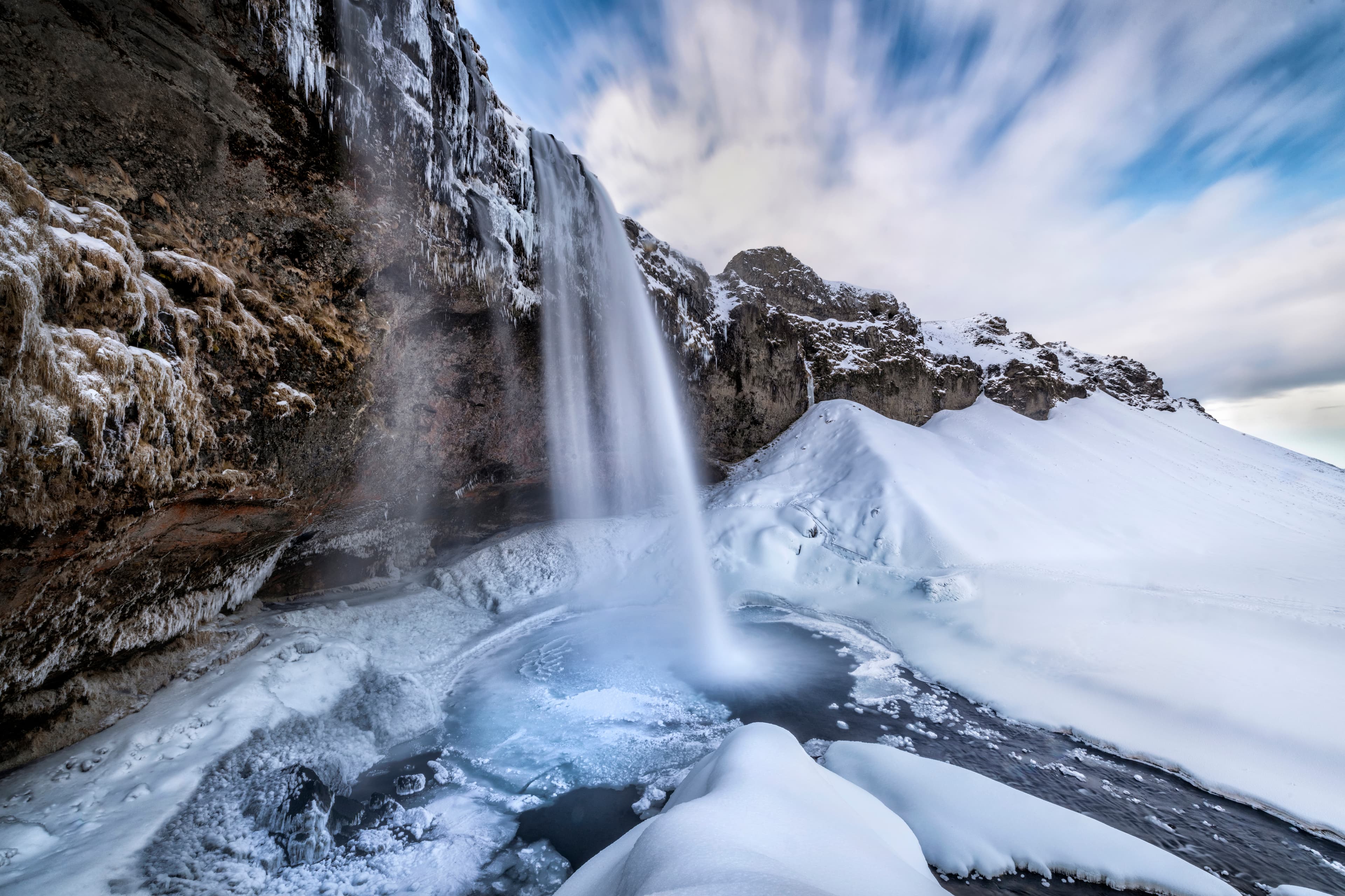 Famous Seljalandsfoss waterfaal on Iceland during winter Famous Seljalandsfoss waterfaal on Iceland during winter