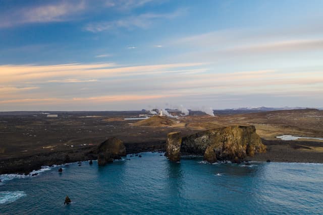 Aerial view of the lighthouse at Reykjanes Peninsula during sunset. Iceland in early spring. Aerial view of the lighthouse at Reykjanes Peninsula during sunset. Iceland in early spring