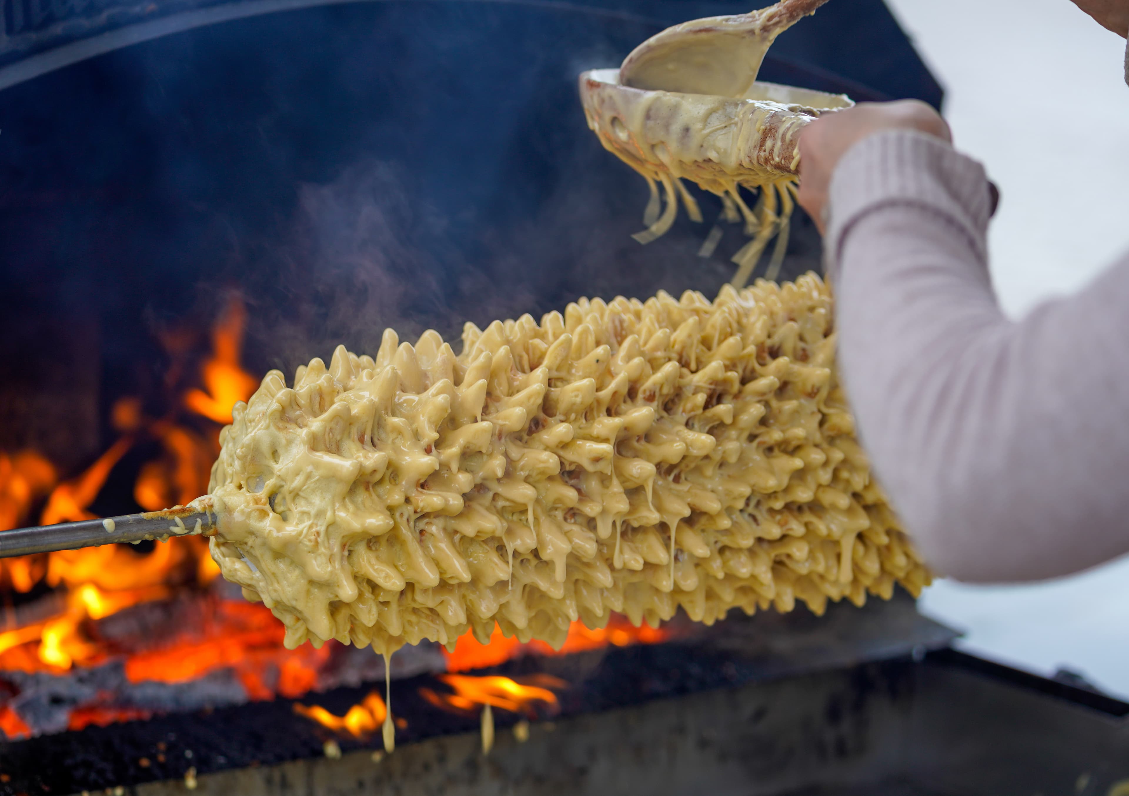 Sakotis is a Polish Lithuanian traditional spit cake. It is a cake made of butter, egg whites and yolks, flour, sugar, and cream, cooked on a rotating spit in an oven or over an open fire Cooking Sakotis in Vilnius, Lithuania. It is traditional spit cake. Cuisine.
