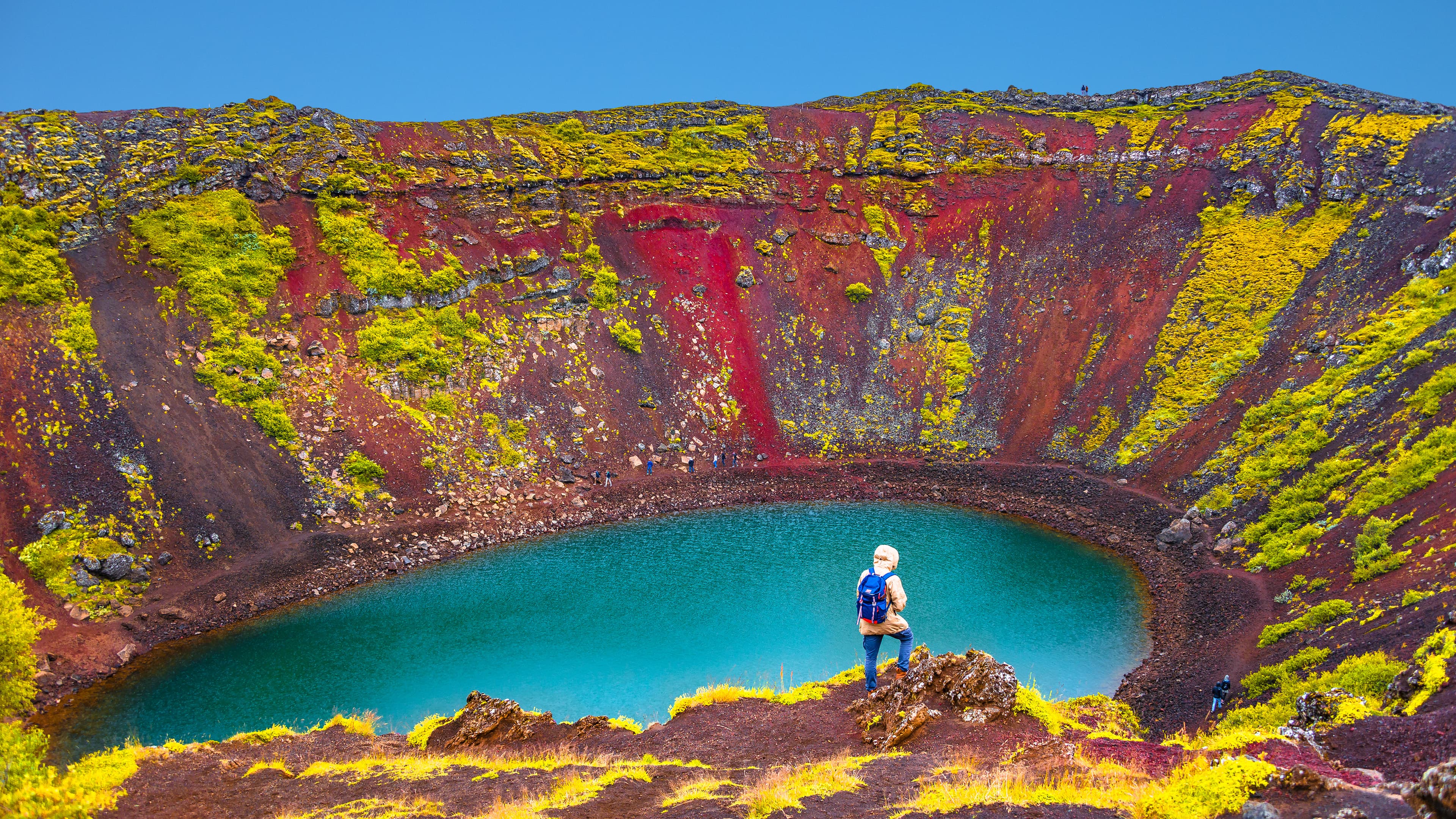 Famous colorful and dangerous Kerid volcanic crater with lake inside on Iceland during sunset Famous colorful and dangerous Kerid volcanic crater with lake inside on Iceland during sunset, summer time