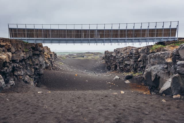 Midlina - the small symbolic footbridge between two continents in Reykjanes Peninsula in Iceland Midlina - the small symbolic footbridge between two continents in Reykjanes Peninsula in Iceland