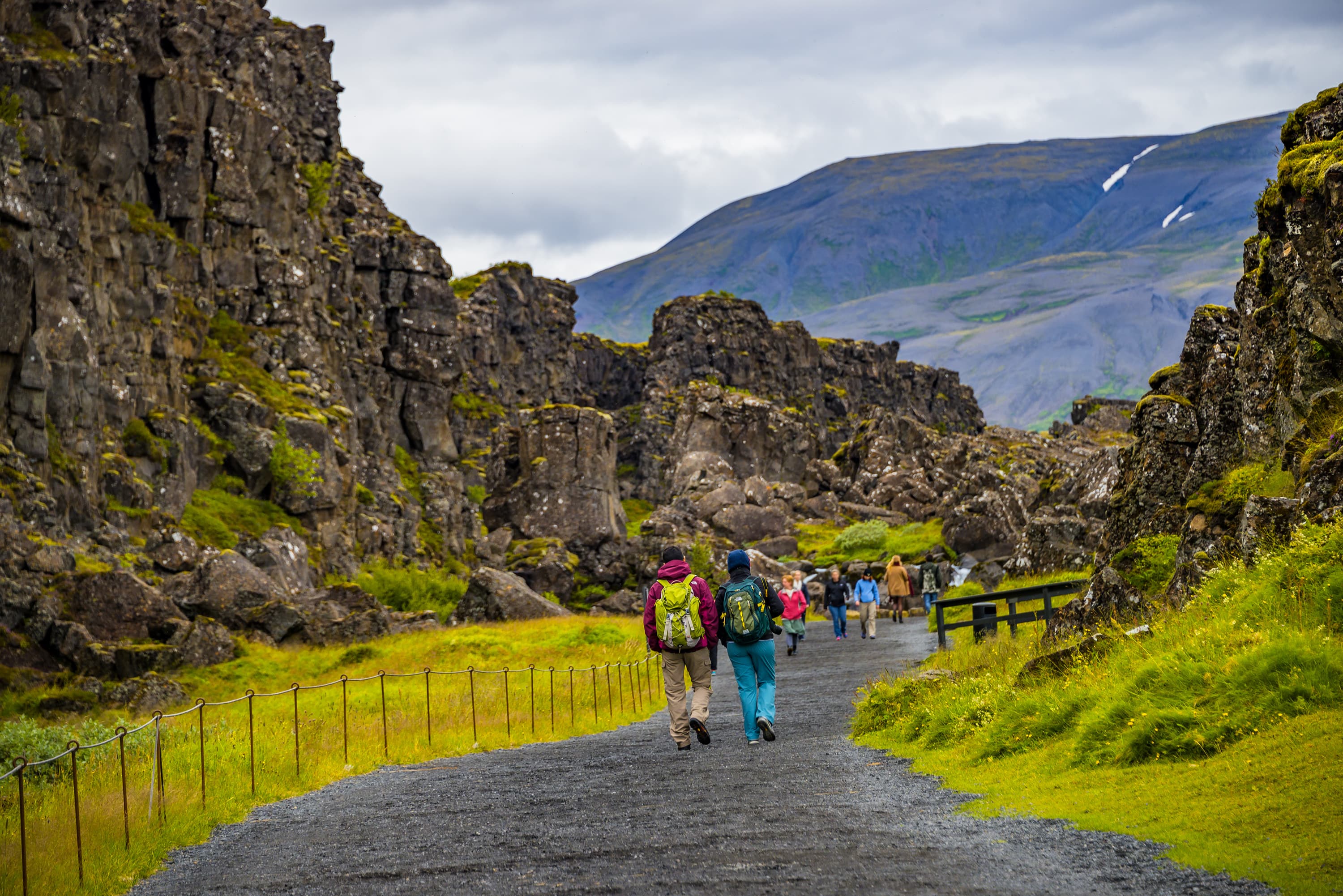 Thingvellir national park, Pingvallavatn huge tectonic plates drifting cracks and tourists on Iceland Thingvellir national park, Pingvallavatn huge tectonic plates drifting cracks and tourists on Iceland, summer time