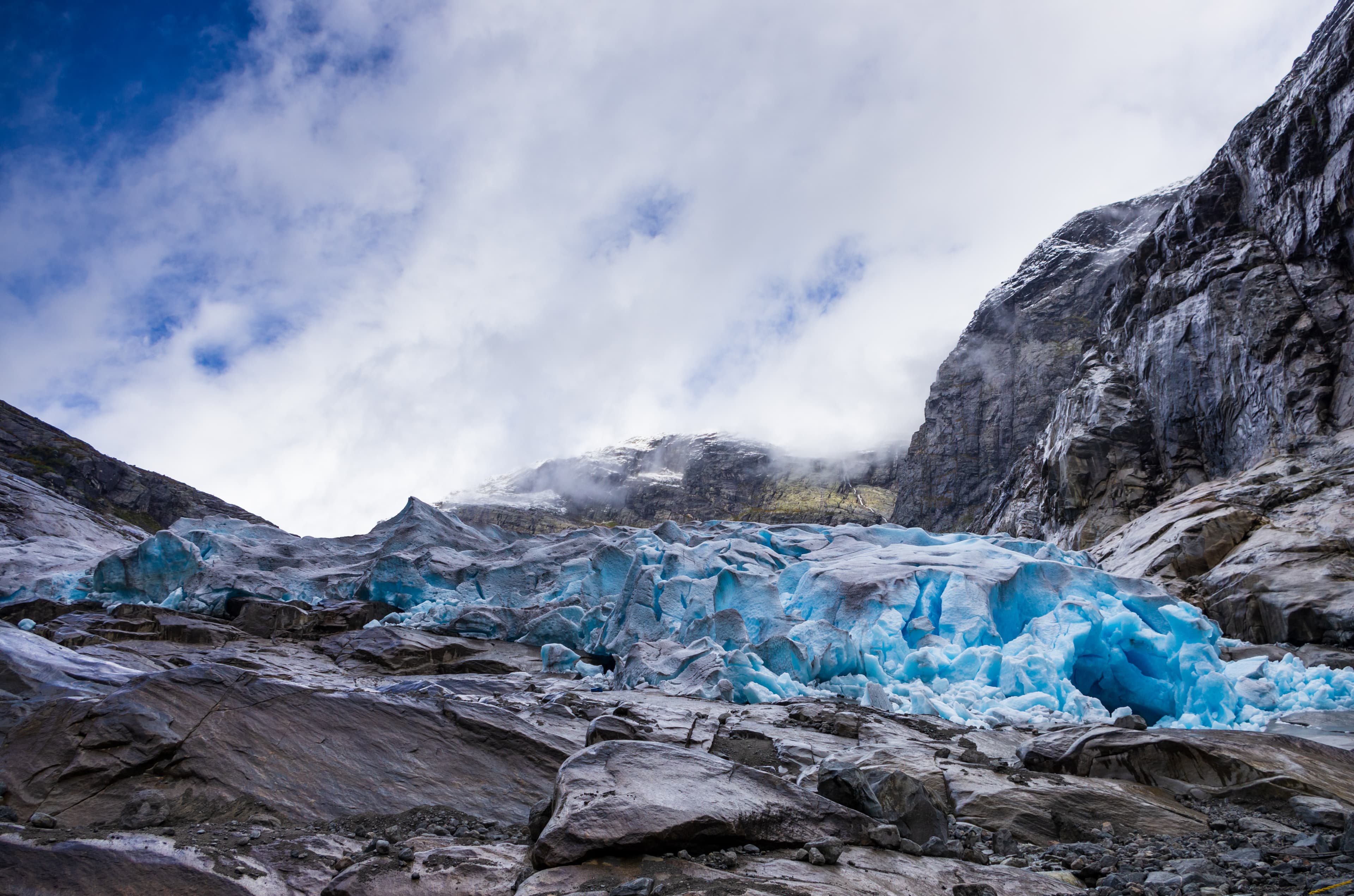 glacier of nigardsbreen with cave make by a river, in norway