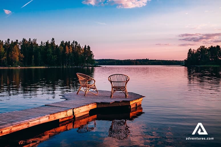 chairs-standing-on-a-pear-with-a-view-over-the-ontario-lake-on-a-sunset-in-canada