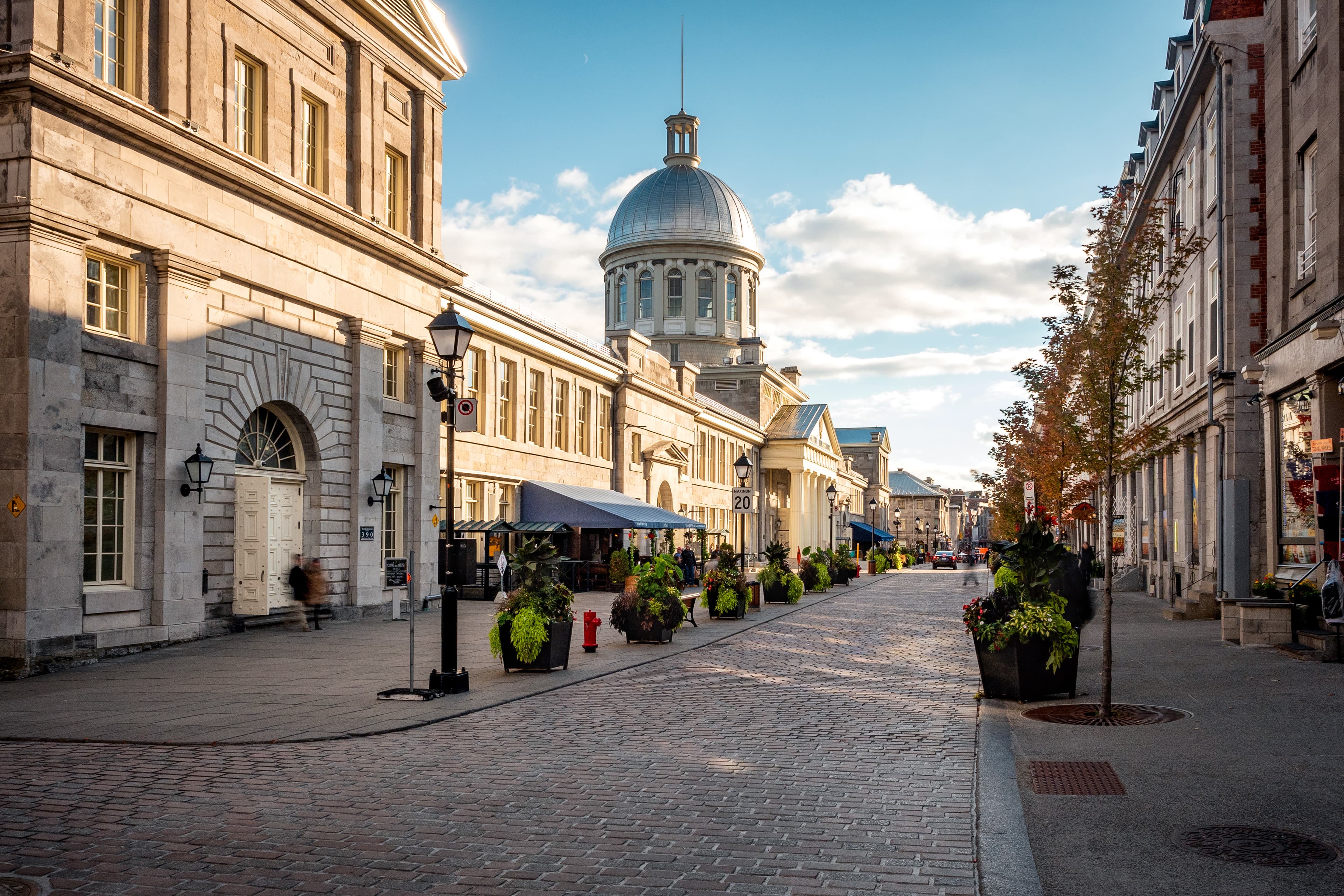 Montreal, Canada - October 13, 2018: Historical landmark Bonsecours Market in Old Montreal during fall season in Quebec, Canada. Traditional Ghost Walk of Old Montreal 4