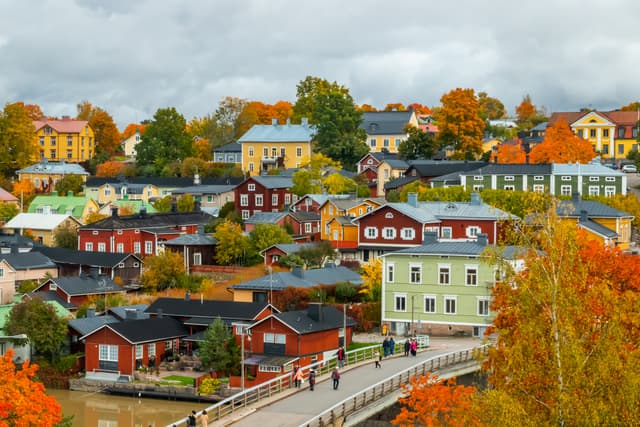 View of old Porvoo, Finland. Beautiful city autumn landscape with colorful wooden buildings. View of old Porvoo, Finland. Beautiful city autumn landscape with colorful wooden buildings.