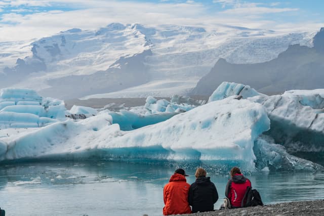 People enjoying scenic view of Jokulsarlon glacier lagoon
