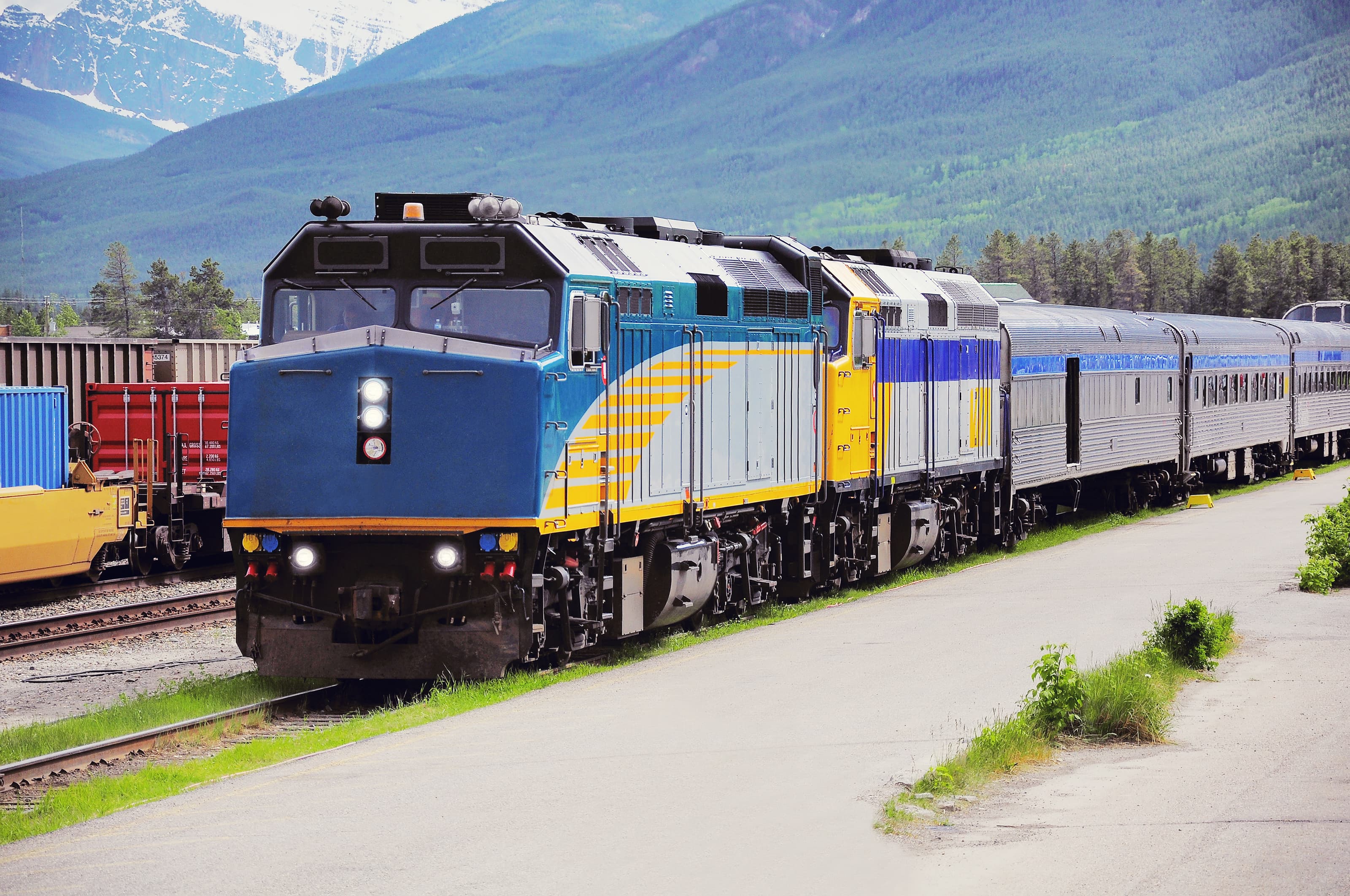 Passenger train from Vancouver stands at Jasper station platform after arrival. Alberta. Canada. Manitoba Region 7
