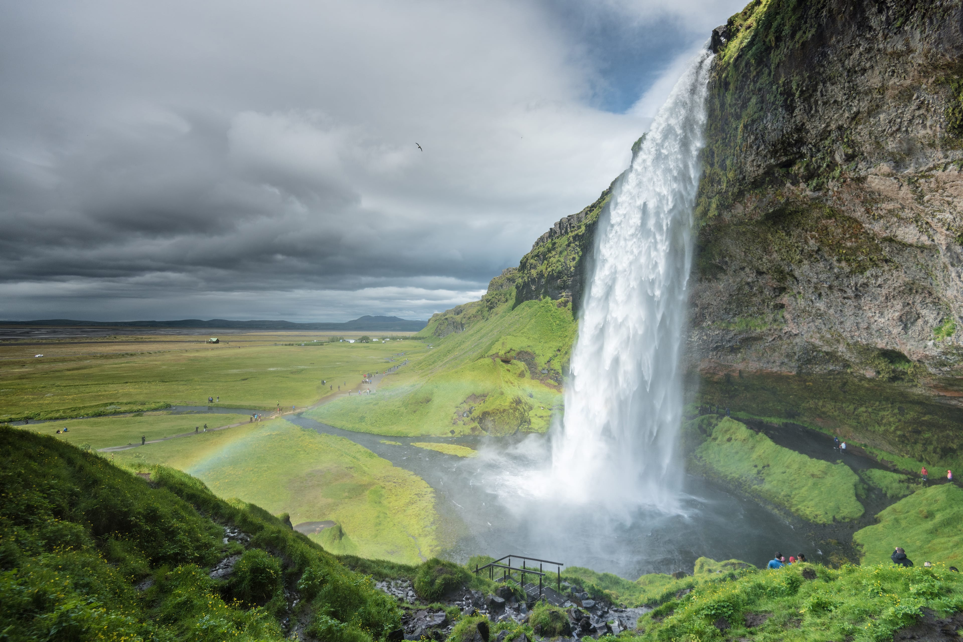 Seljalandsfoss-waterfall-summer-rainbow-people