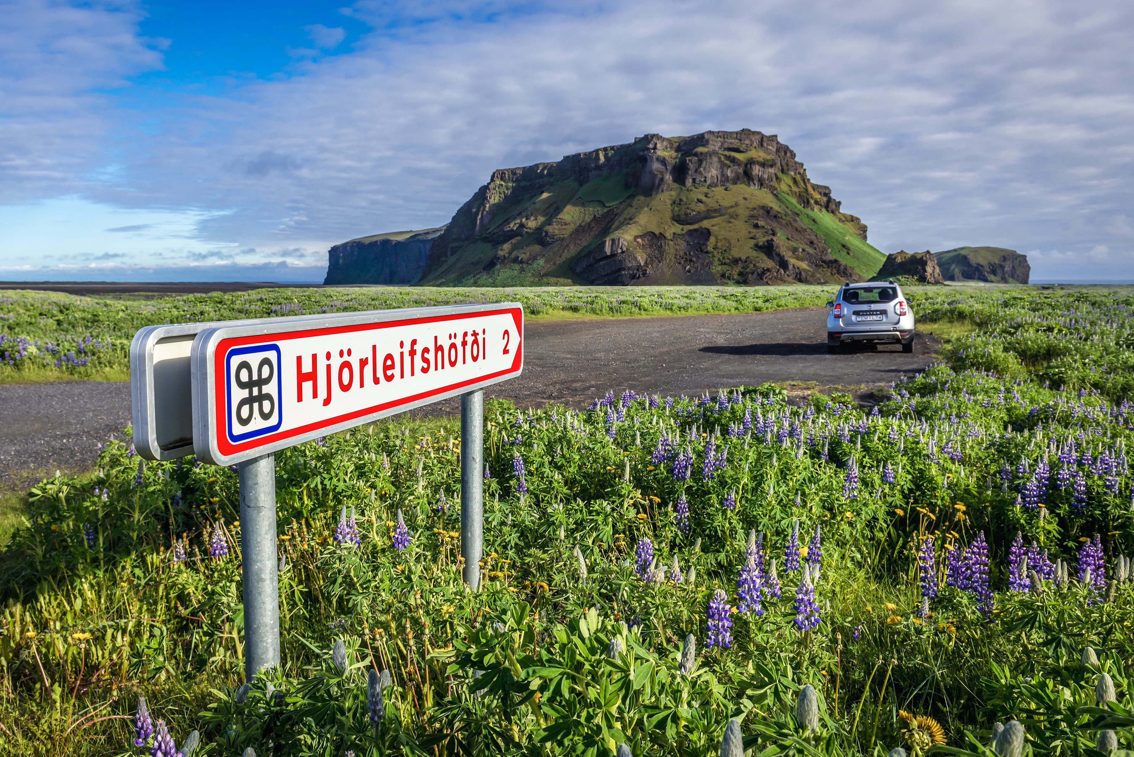 Sign near Hjorleifshofdi inselberg near Vik town, Iceland Sign near Hjorleifshofdi inselberg near Vik town, Iceland