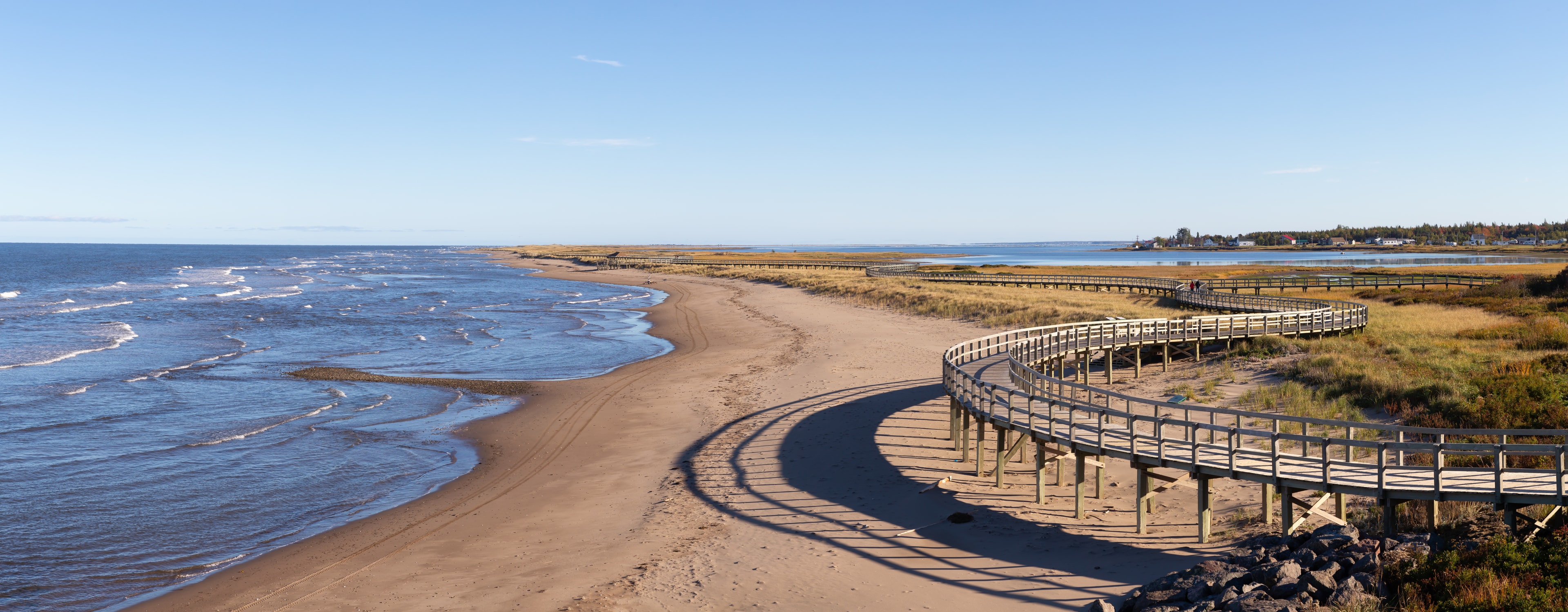 Panoramic view of a beautiful sandy beach on the Atlantic Ocean Coast. Taken in La Dune de Bouctouche, New Brunswick, Canada. New Brunswick Region 06