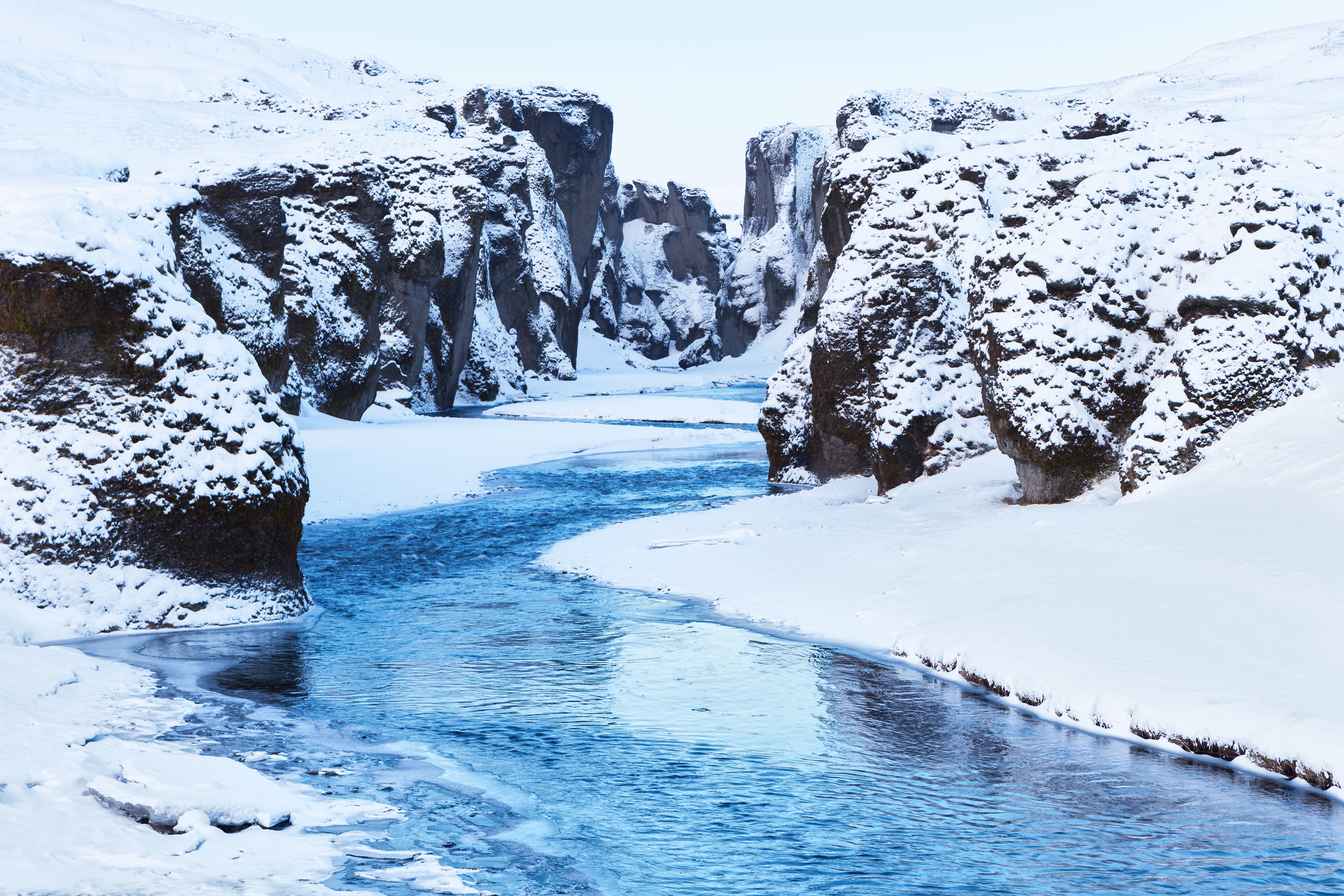 View of  Fjadrargljufur canyon and Fjadra river in winter, Iceland. View of  Fjadrargljufur canyon and Fjadra river in winter, Iceland.