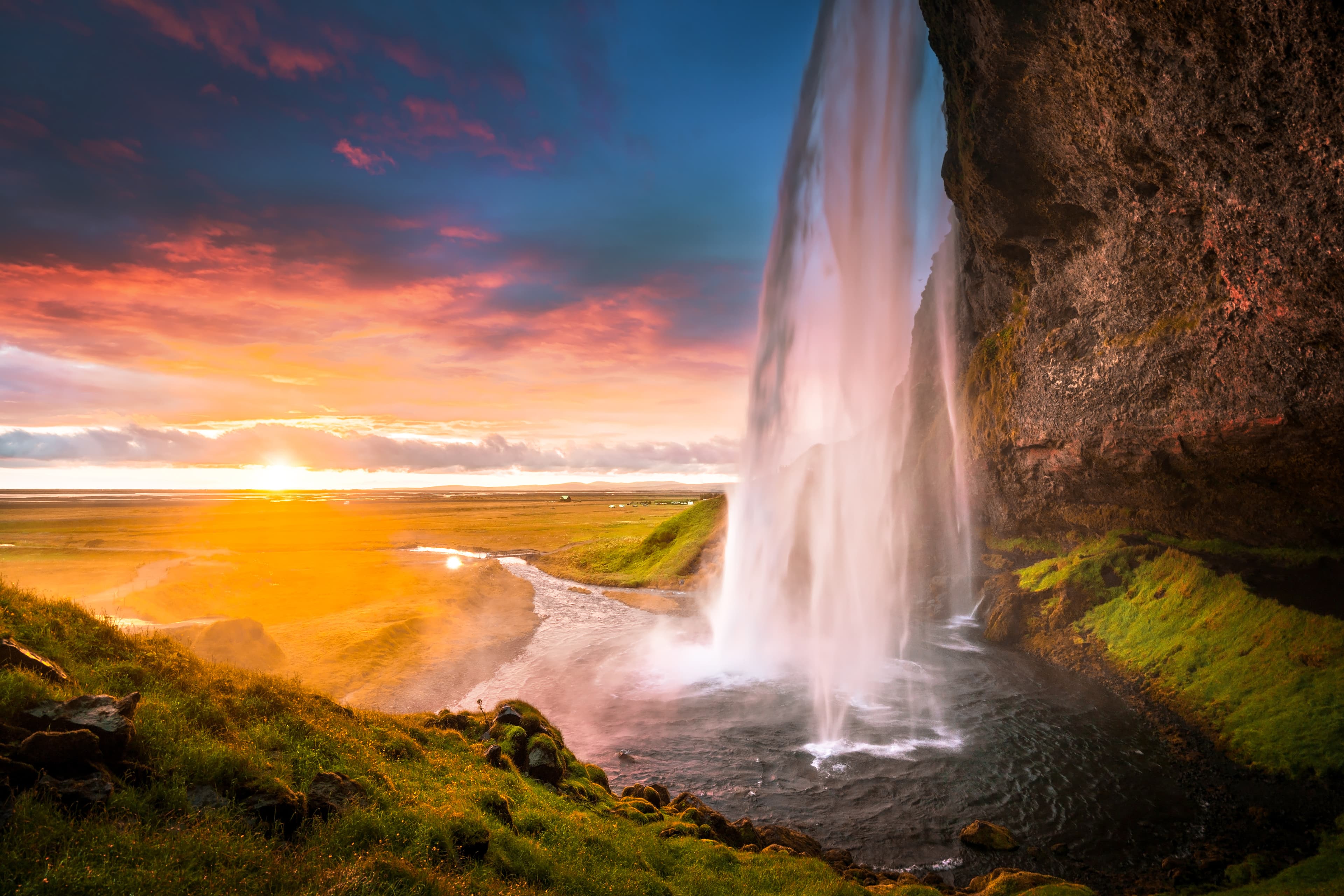 Seljalandsfoss waterfall at sunset, Iceland Seljalandsfoss waterfall at sunset, Iceland