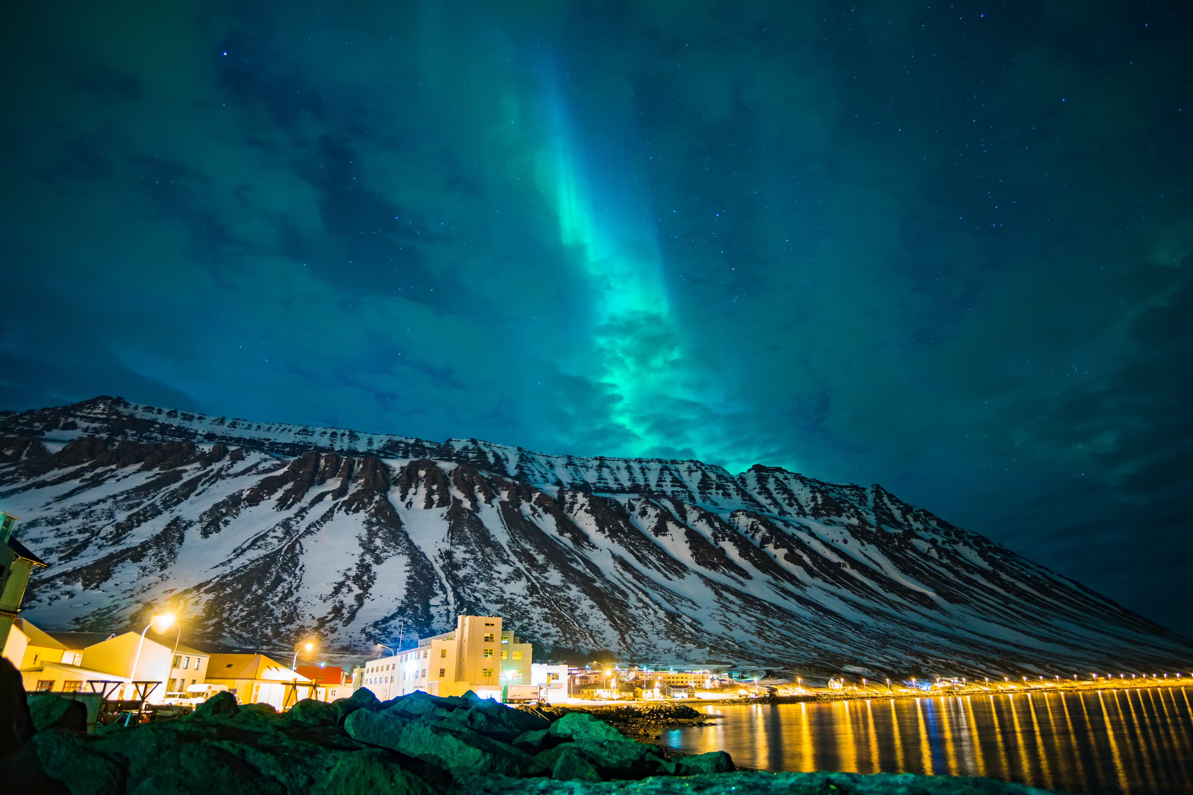 northern lights over the mountains and a cloudy sky northern lights over the mountains and a cloudy sky