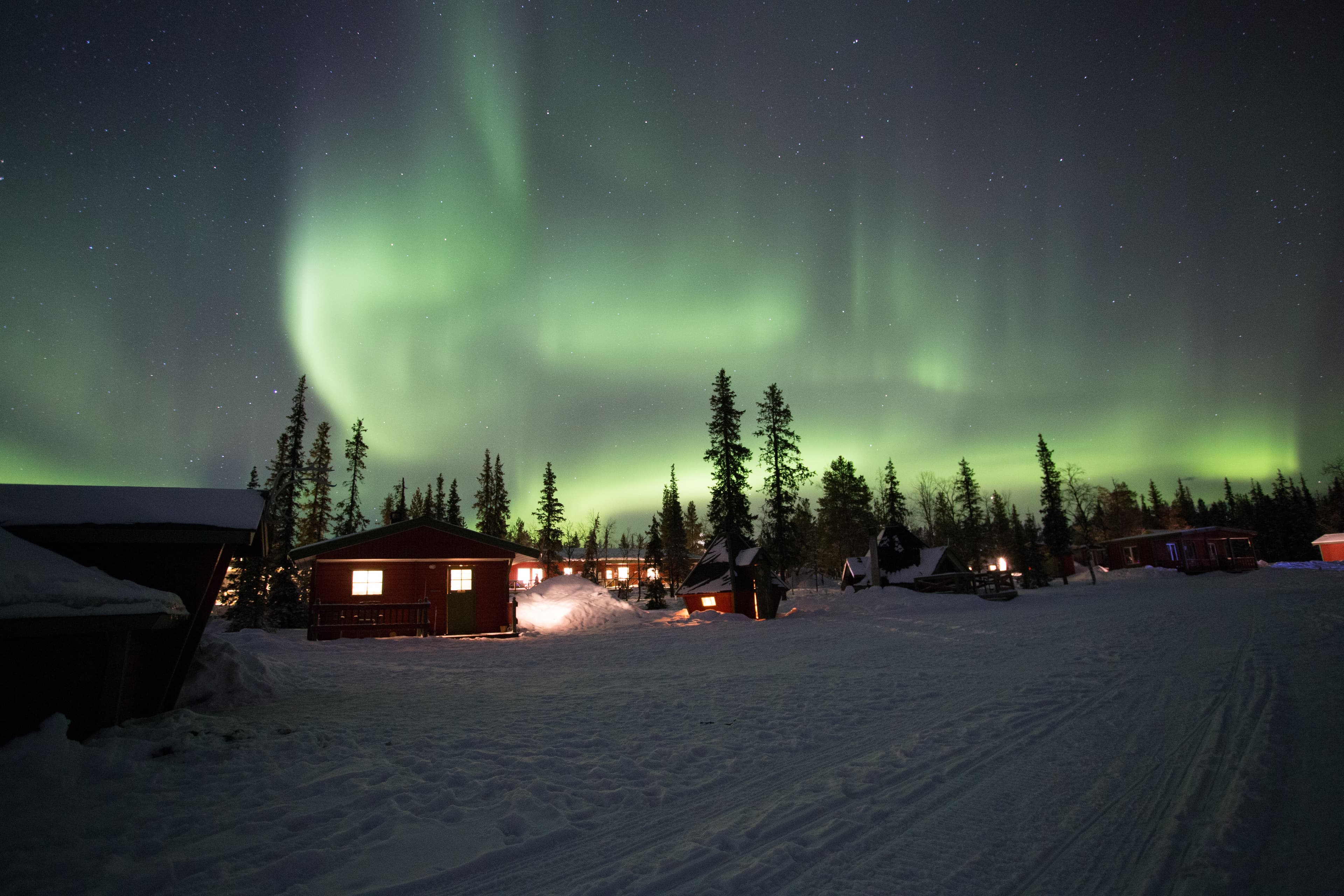 Northern Lights dancing over the sky at camp Alta, Kiruna, Lapland, Sweden. The most amazing phenomena on earth. Northern Lights dancing over the sky at camp Alta, Kiruna, Lapland, Sweden. The most amazing phenomena on earth.