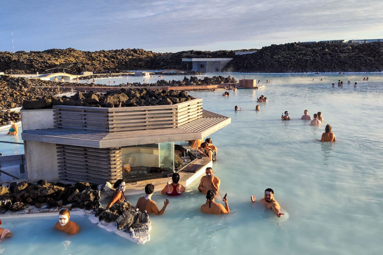 people-enjoying-blue-lagoon-iceland-sunny-day
