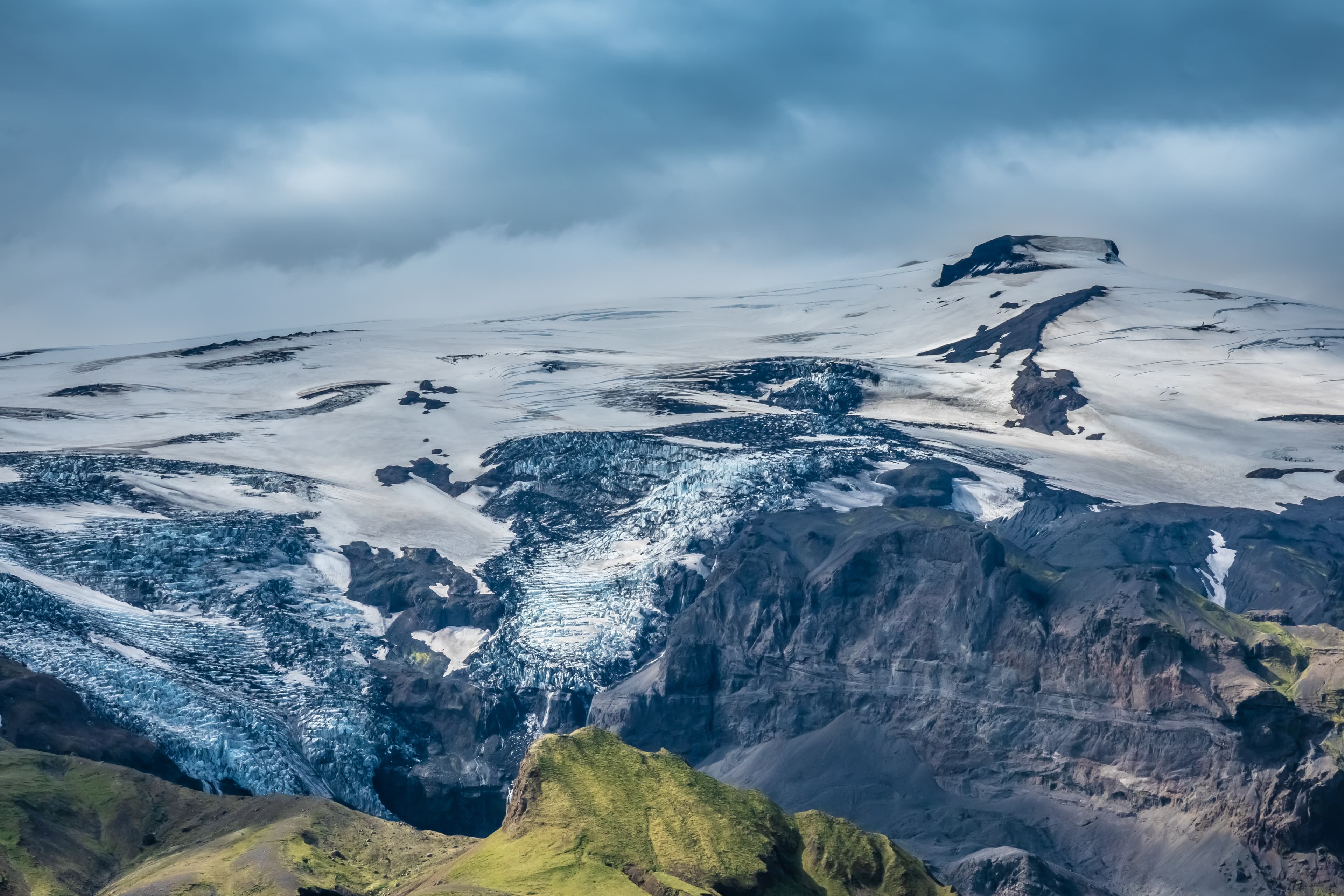 The top of the Eyjafjallajokull glacier and volcano  from Thorsmork in the Highlands of Iceland at southern end of the famous Laugavegur hiking trail. The top of the Eyjafjallajokull glacier and volcano  from Thorsmork in the Highlands of Iceland at southern end of the famous Laugavegur hiking trail.