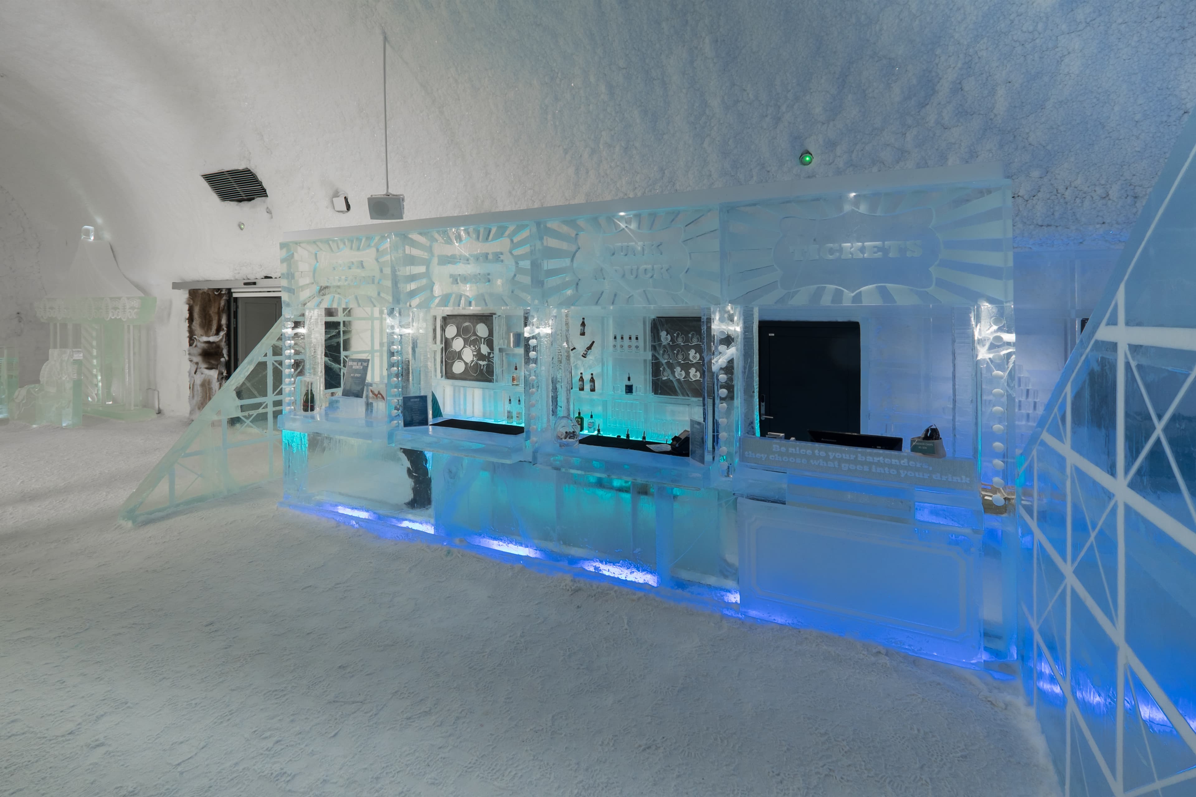 JUKKASJARVI, SWEDEN - MARCH 16 2020: Bar of the icy cold ice bar of the Ice hotel 365 in Jukkasjarvi in Sweden. The entire bar is made of ice blocks