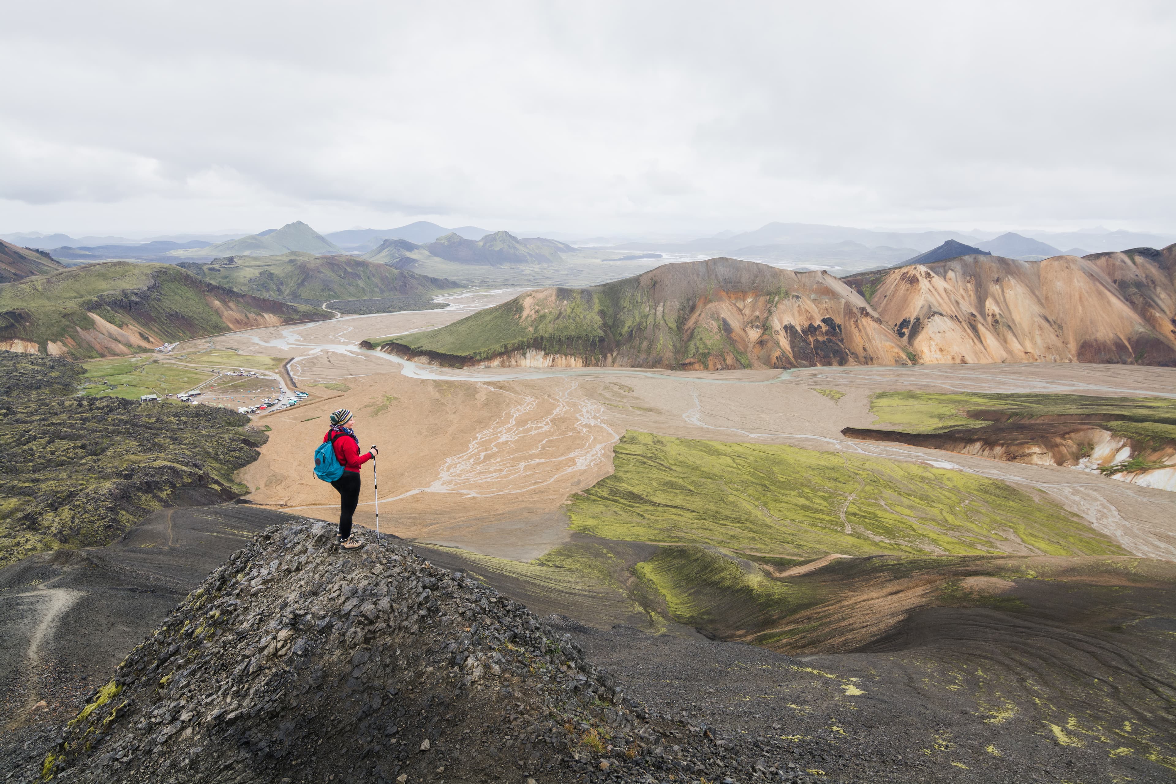 Woman hiking in the colourful mountains of Landmannalaugar national park, Iceland. Woman hiking in the colourful mountains of Landmannalaugar national park, Iceland